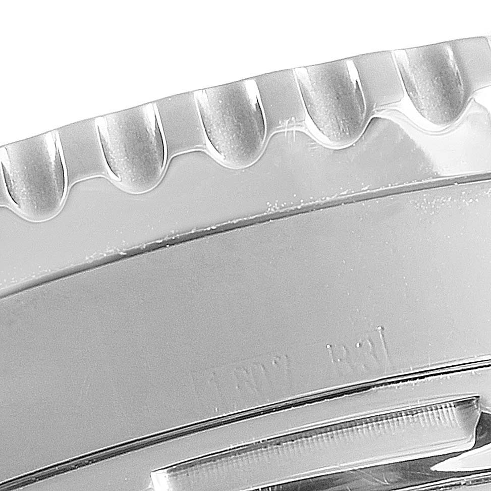 This close-up image displays the bezel of a Breitling Navitimer A23322 Men's Stainless Steel Black Dial A23322 Men's Stainless Steel Black Dial watch.