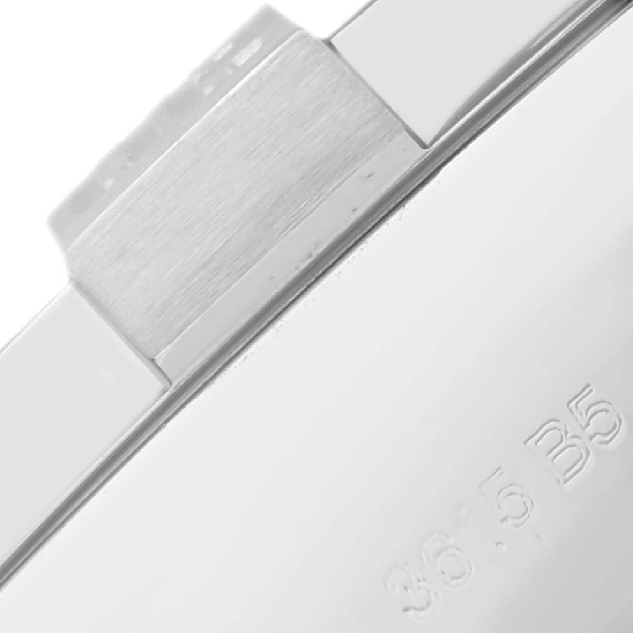 This close-up image shows the side view of a Breitling Avenger A13371 Men's Stainless Steel Black Dial A13371 Men's Stainless Steel Black Dial watch, focusing on the bezel and part of the case.