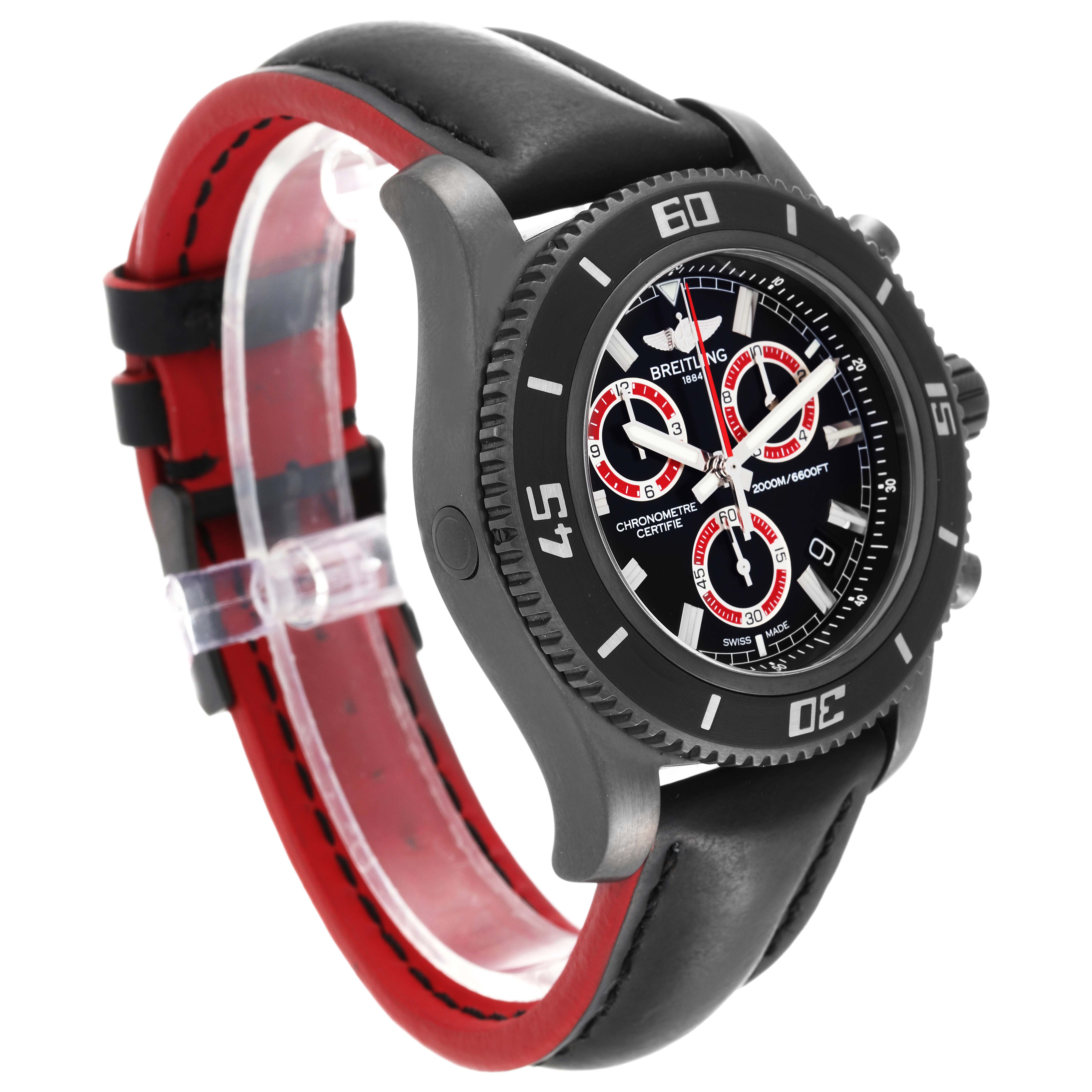 The Breitling Superocean M73310B7 Men's Stainless Steel Black Dial M73310B7 Men's Stainless Steel Black Dial watch is shown at an angle, highlighting the face, bezel, and black-red strap.