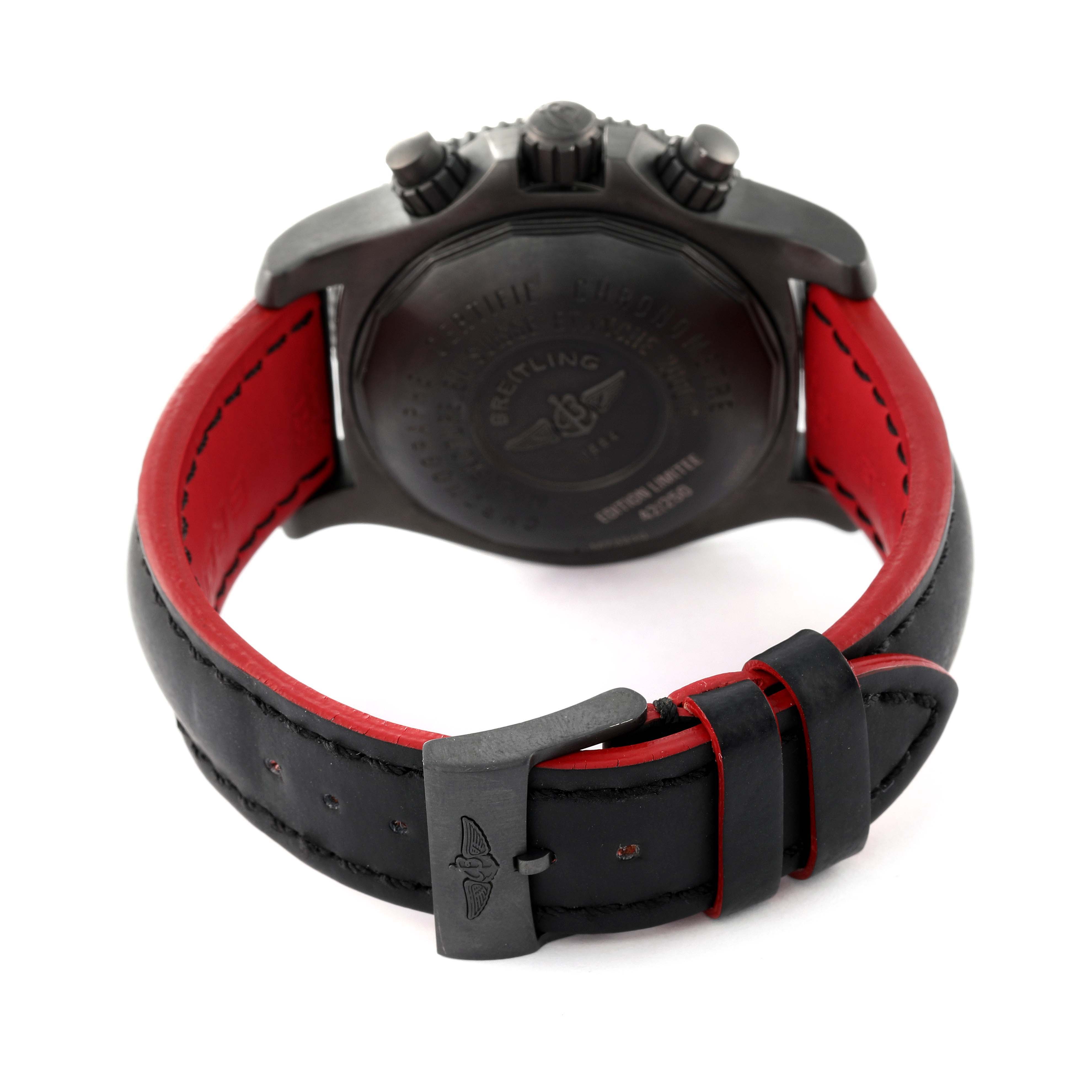 The image shows the back view of a Breitling Superocean M73310B7 Men's Stainless Steel Black Dial M73310B7 Men's Stainless Steel Black Dial watch, highlighting its caseback, crown, and leather strap with a buckle.