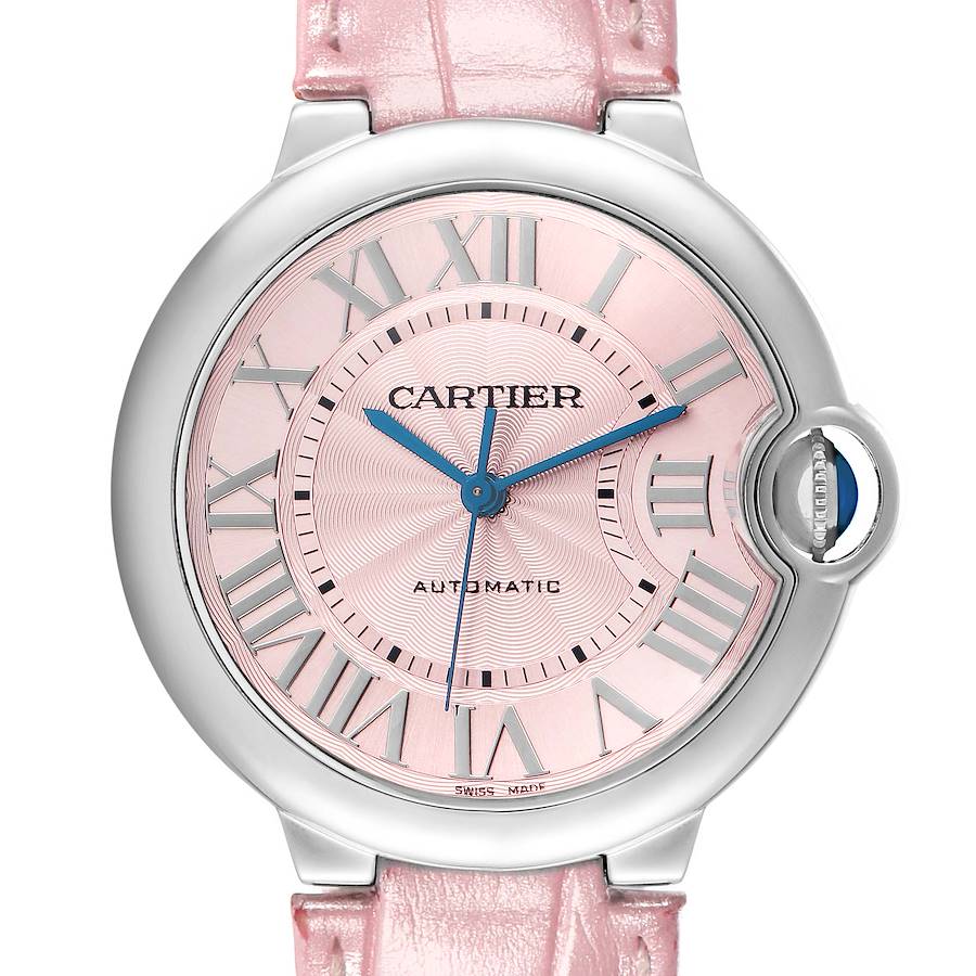 The Cartier Ballon Bleu WSBB0007 Women's Stainless Steel Pink Dial watch is shown from the front, highlighting the pink dial, Roman numerals, and metal case with a crown.