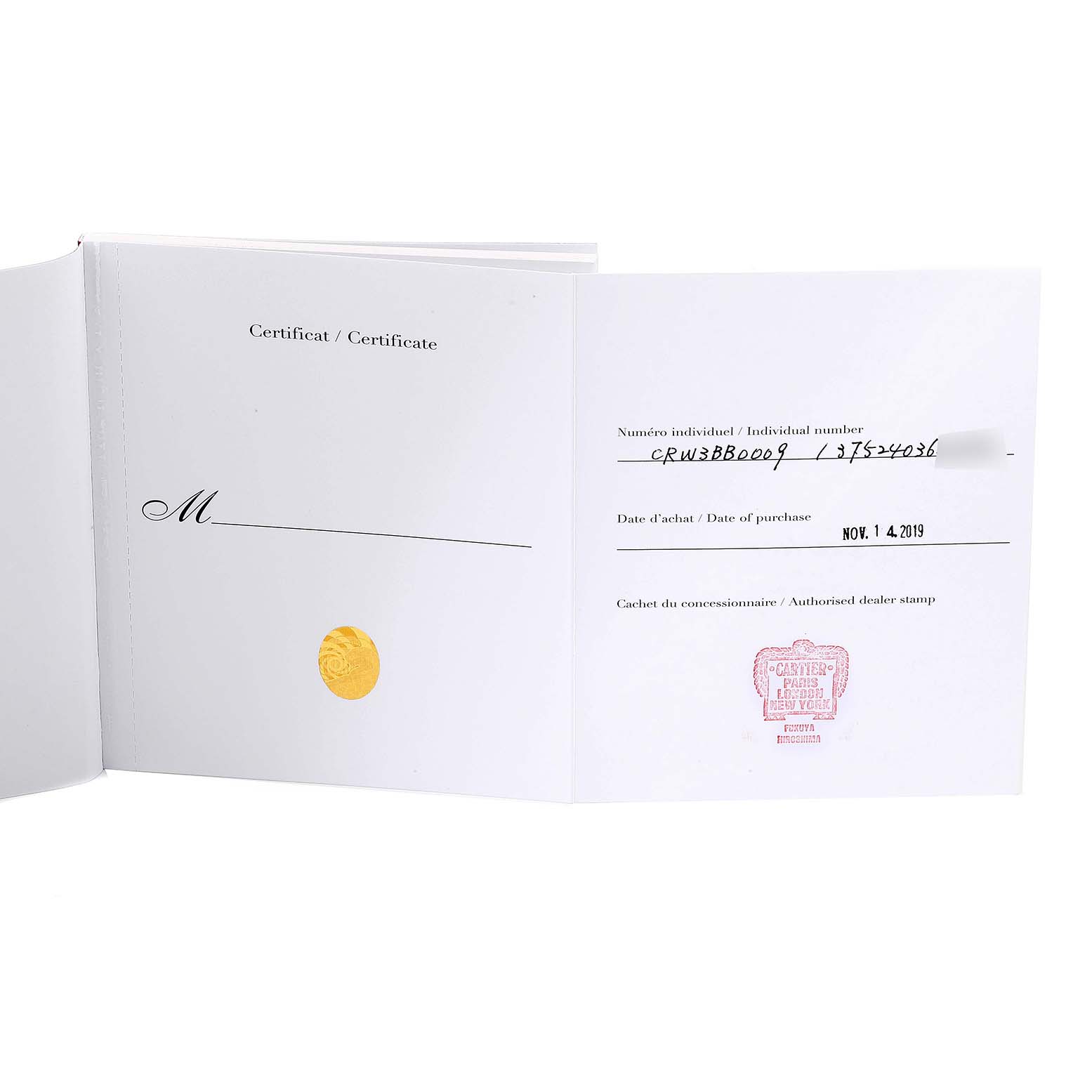 The image shows an open authenticity certificate and date of purchase for a Ballon Bleu model by Cartier.