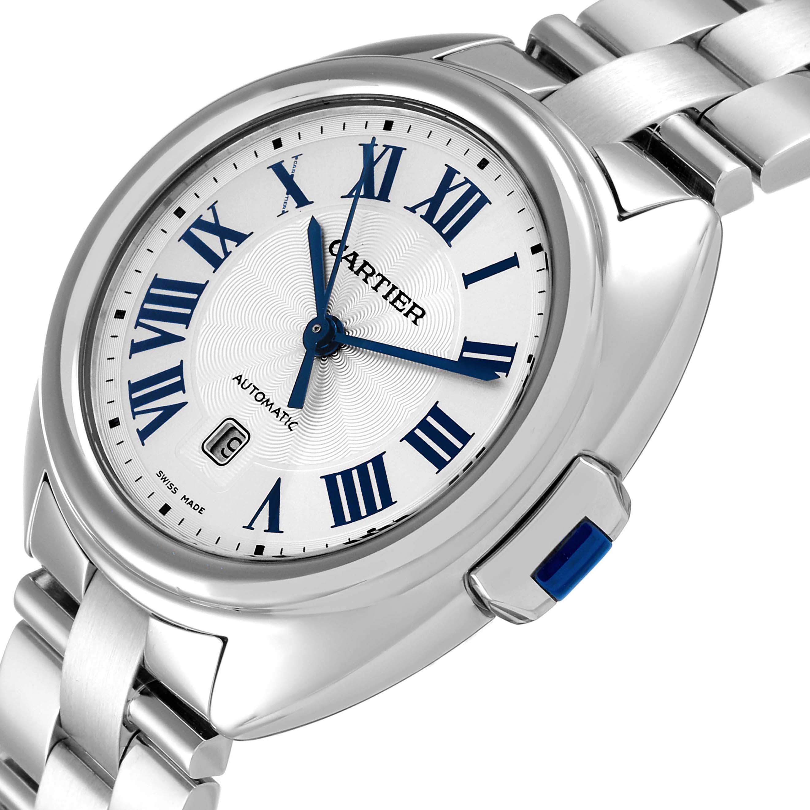 The image shows a close-up of the Cartier Cle WSCL0005 Women's Stainless Steel Blue Dial WSCL0005 Women's Stainless Steel Blue Dial model watch, highlighting the watch face, bracelet, and crown.