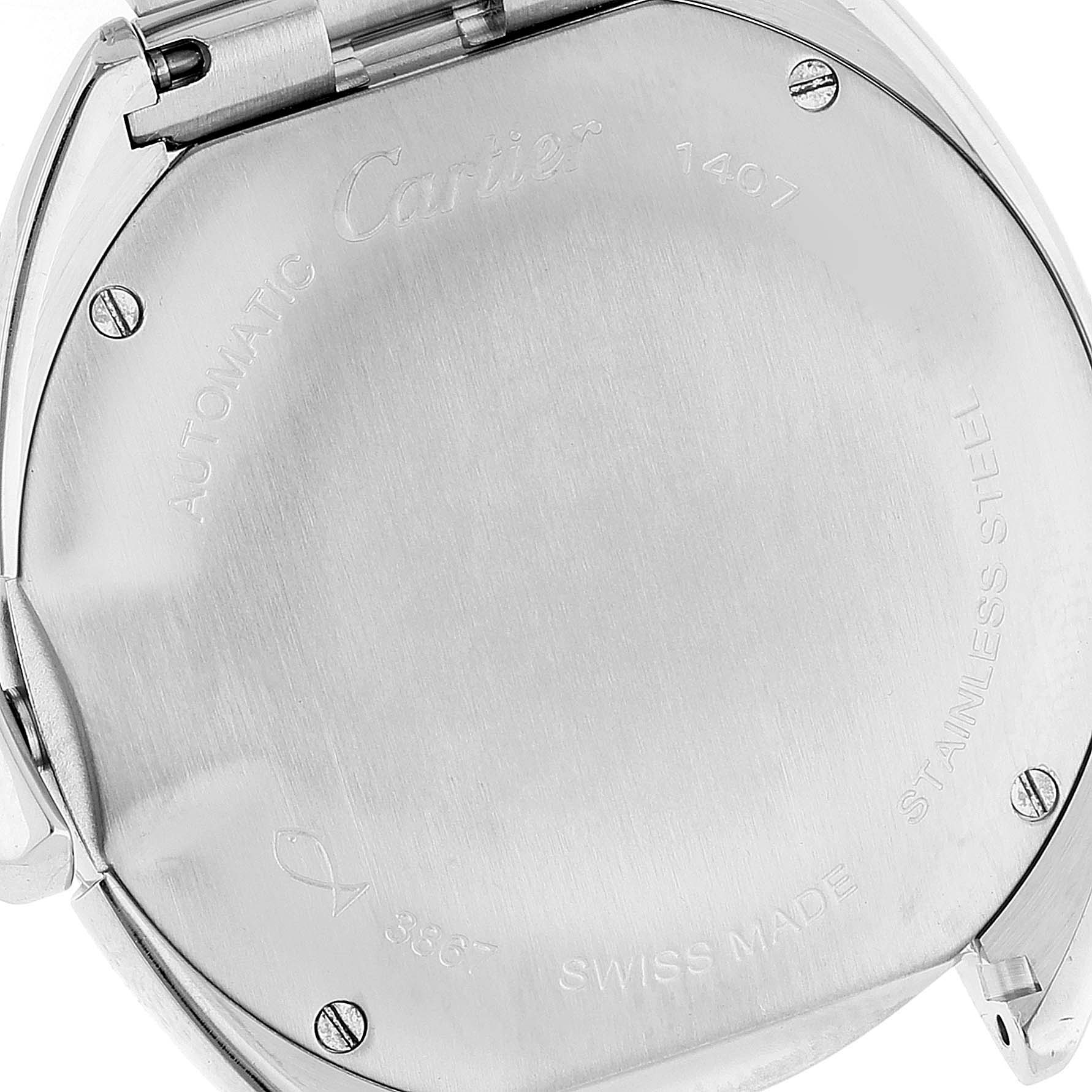 This image shows the case back of a Cle de Cartier watch, highlighting engravings and stainless steel material.