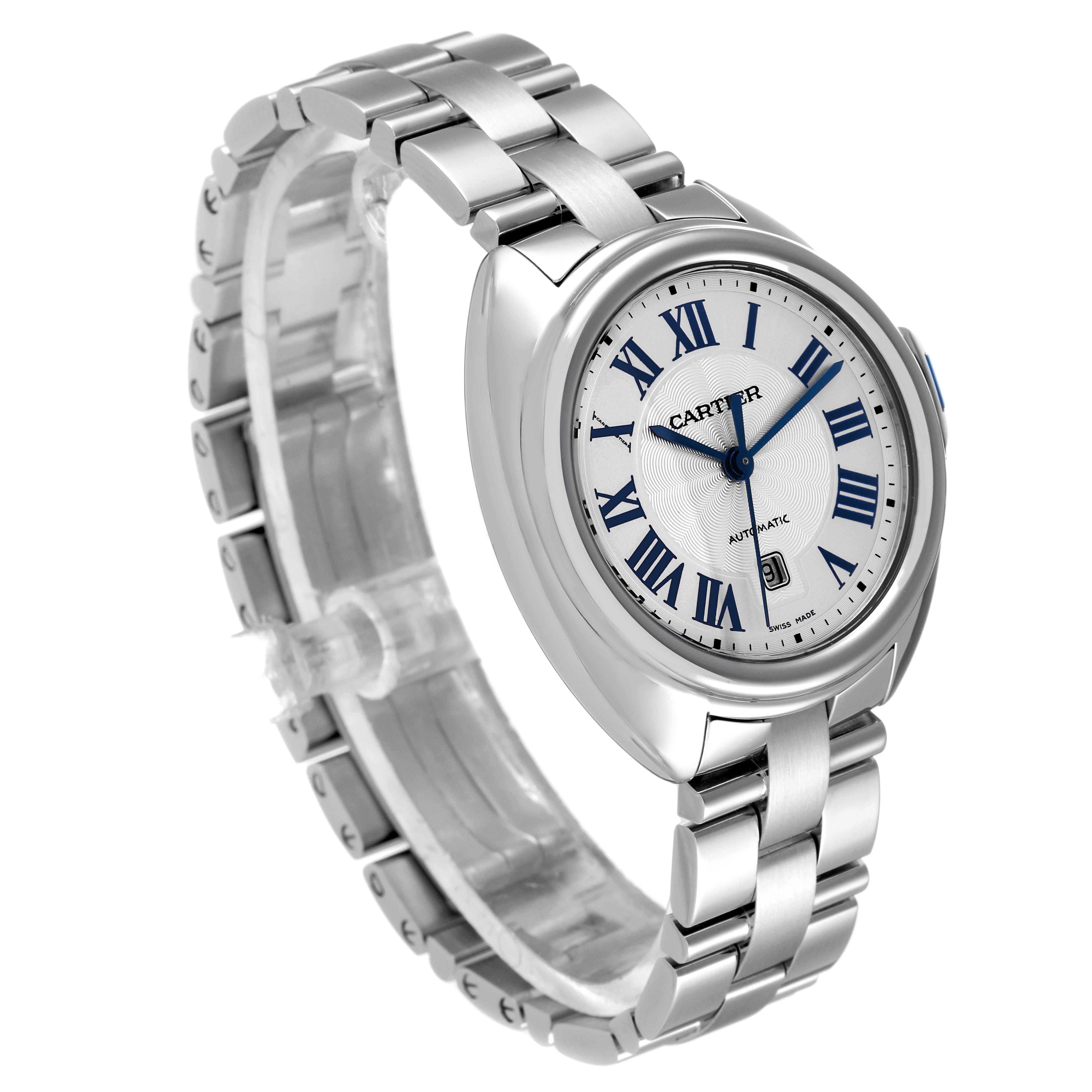 The Cle model by Cartier is shown at an oblique angle, displaying the watch face, bracelet, and side profile.