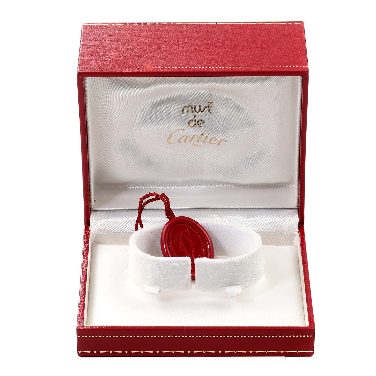 This image shows a red Cartier Panthere W25029B6 Women's Yellow Gold Silver Dial W25029B6 Women's Yellow Gold Silver Dial watch box open with a white cushion inside.