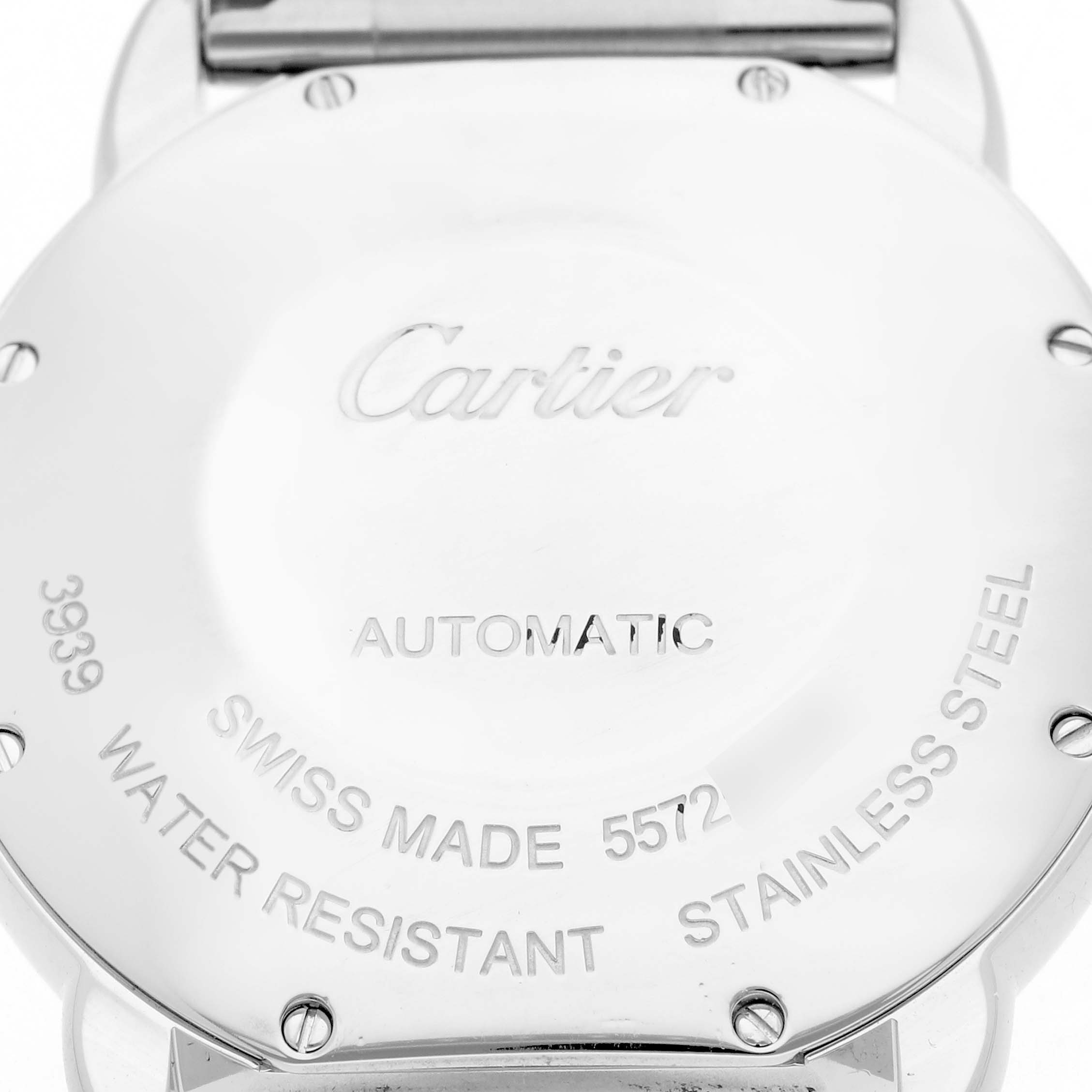 The image shows the back of a Cartier Ronde WSRN0012 Men
s Stainless Steel Silver Dial watch, displaying engravings such as "Automatic," "Swiss Made," and "Water Resistant."