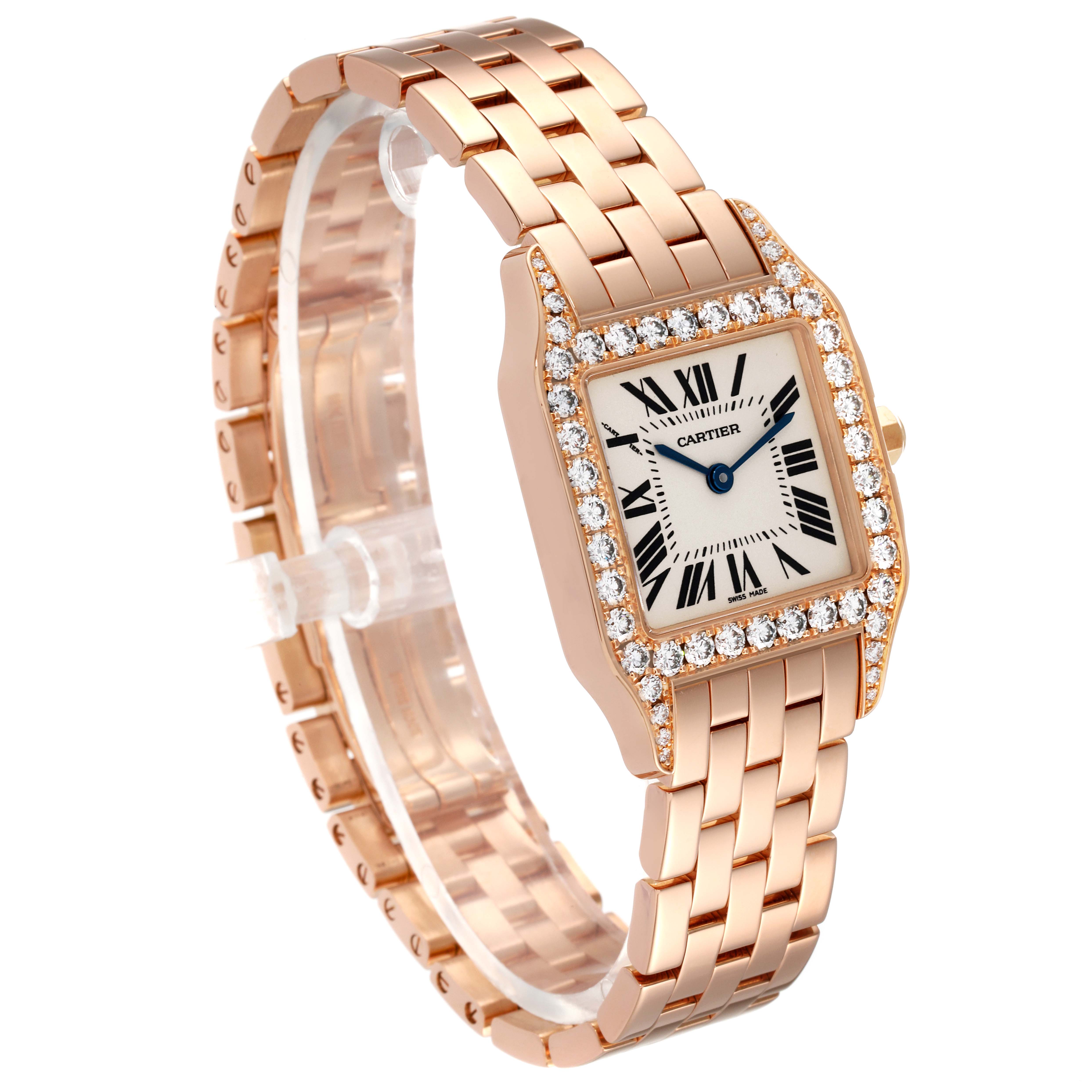 The image shows a Santos Demoiselle watch by Cartier from a front angle, highlighting the dial, bezel, and bracelet.