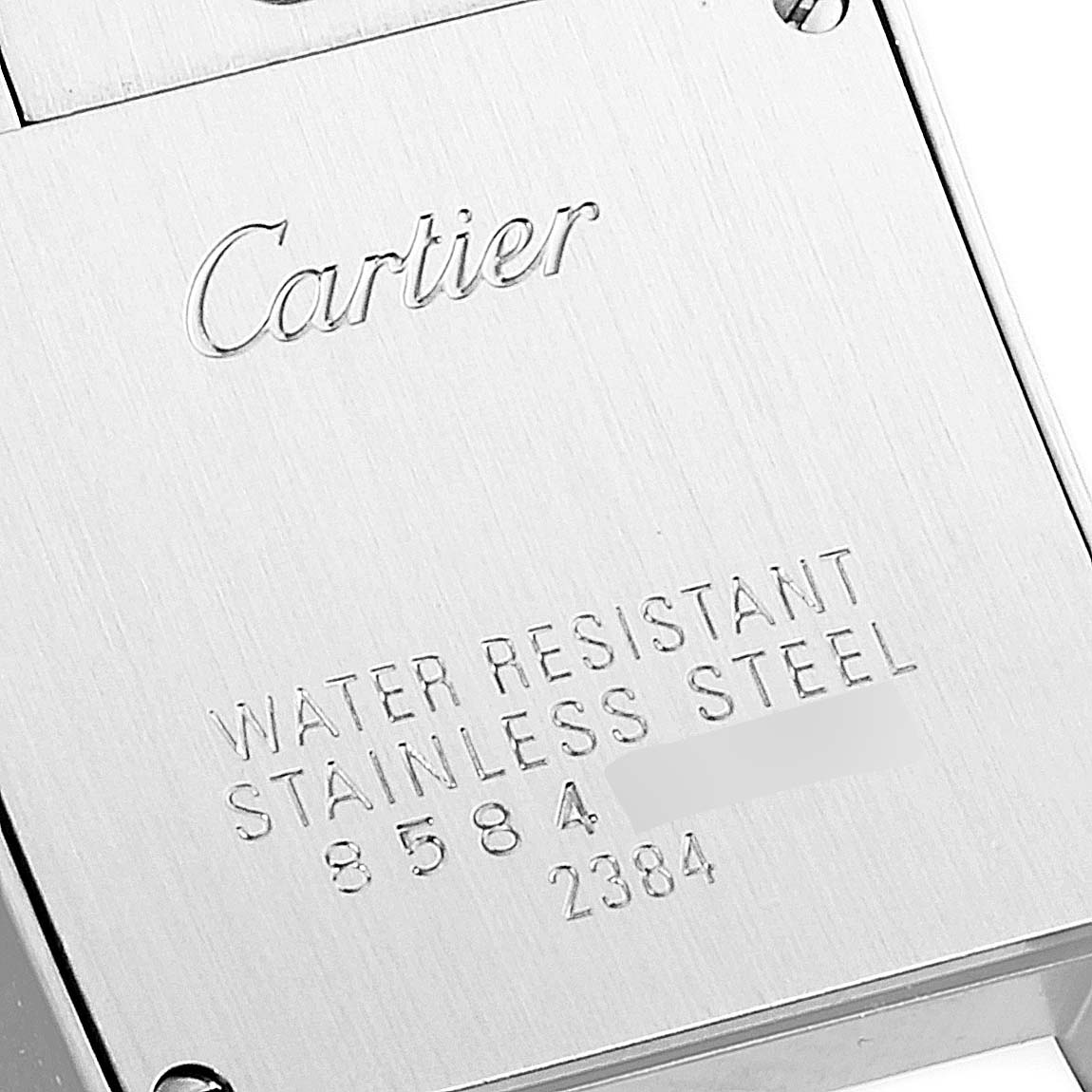 This image shows the back case of a Cartier Tank Francaise W51028Q3 Women
s Stainless Steel Mother of Pearl Dial W51028Q3 Women
s Stainless Steel Mother of Pearl Dial watch, highlighting the brand name and water resistance details.