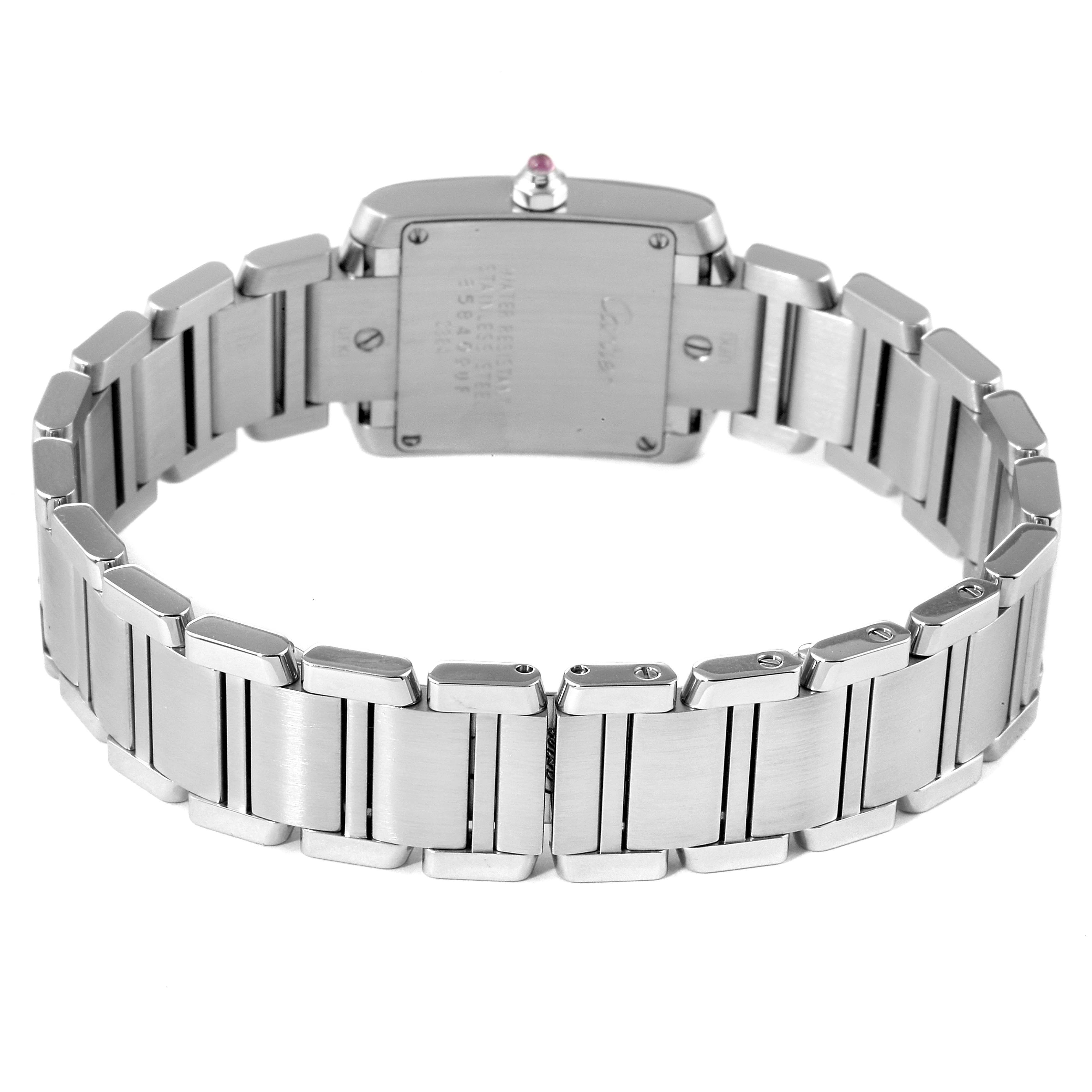 The image shows the back view of a Tank Francaise model by Cartier, highlighting the stainless steel bracelet and case back.