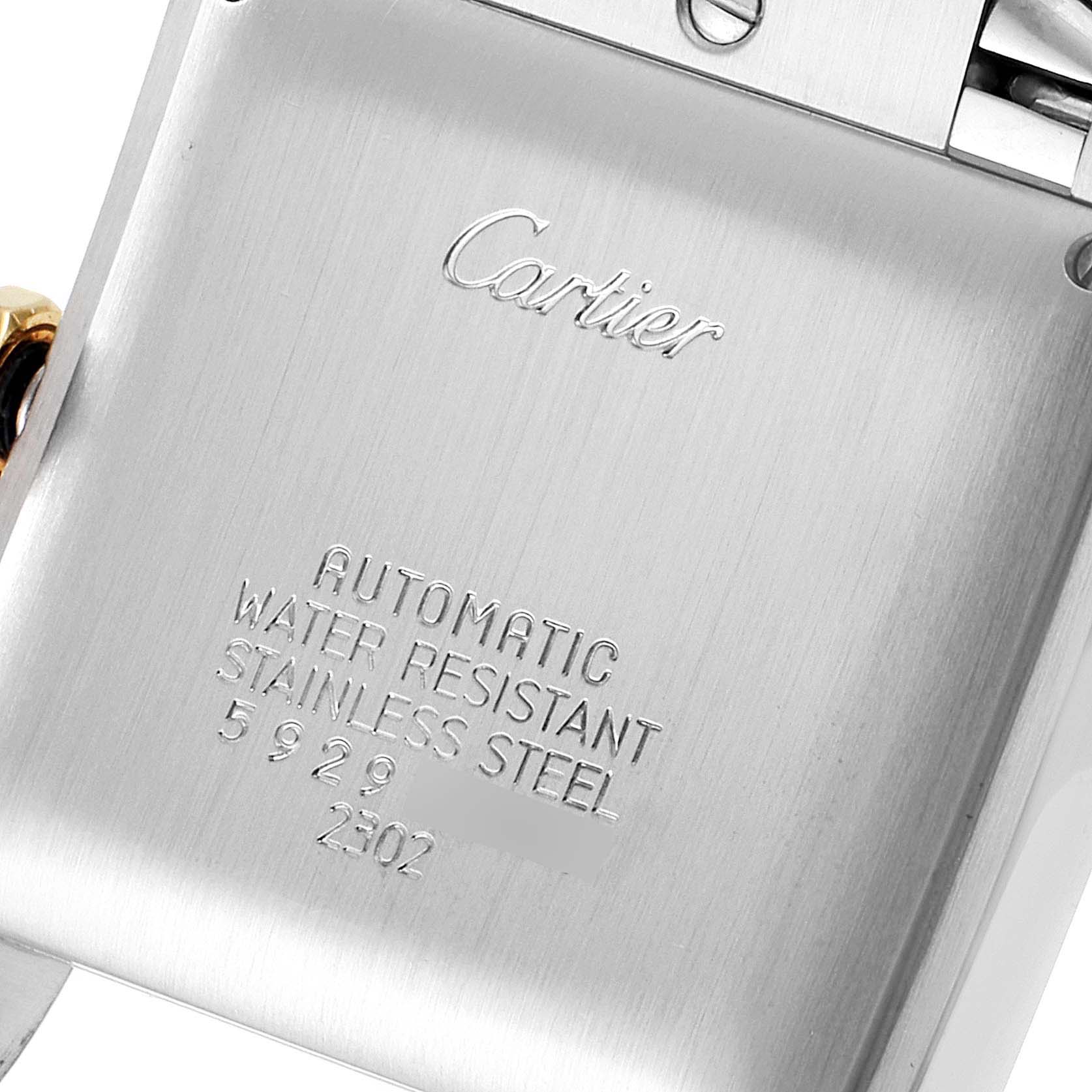The image shows the back case of a Cartier Tank Francaise W51005Q4 Men's Steel and Gold (two tone) Silver Dial W51005Q4 Men's Steel and Gold (two tone) Silver Dial watch, highlighting its branding and specifications.