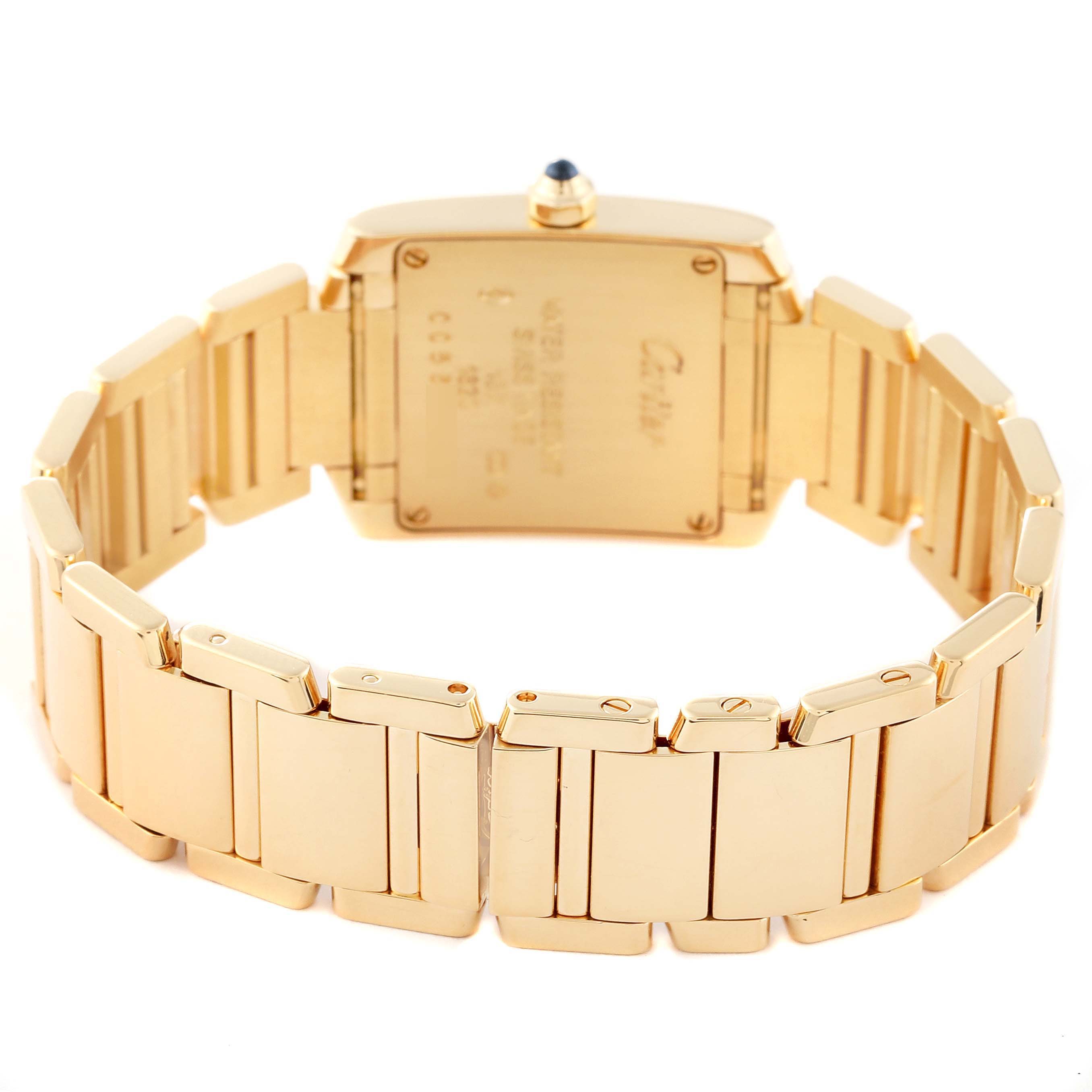 The image shows the back case and metal bracelet of a gold Cartier Tank Française watch.