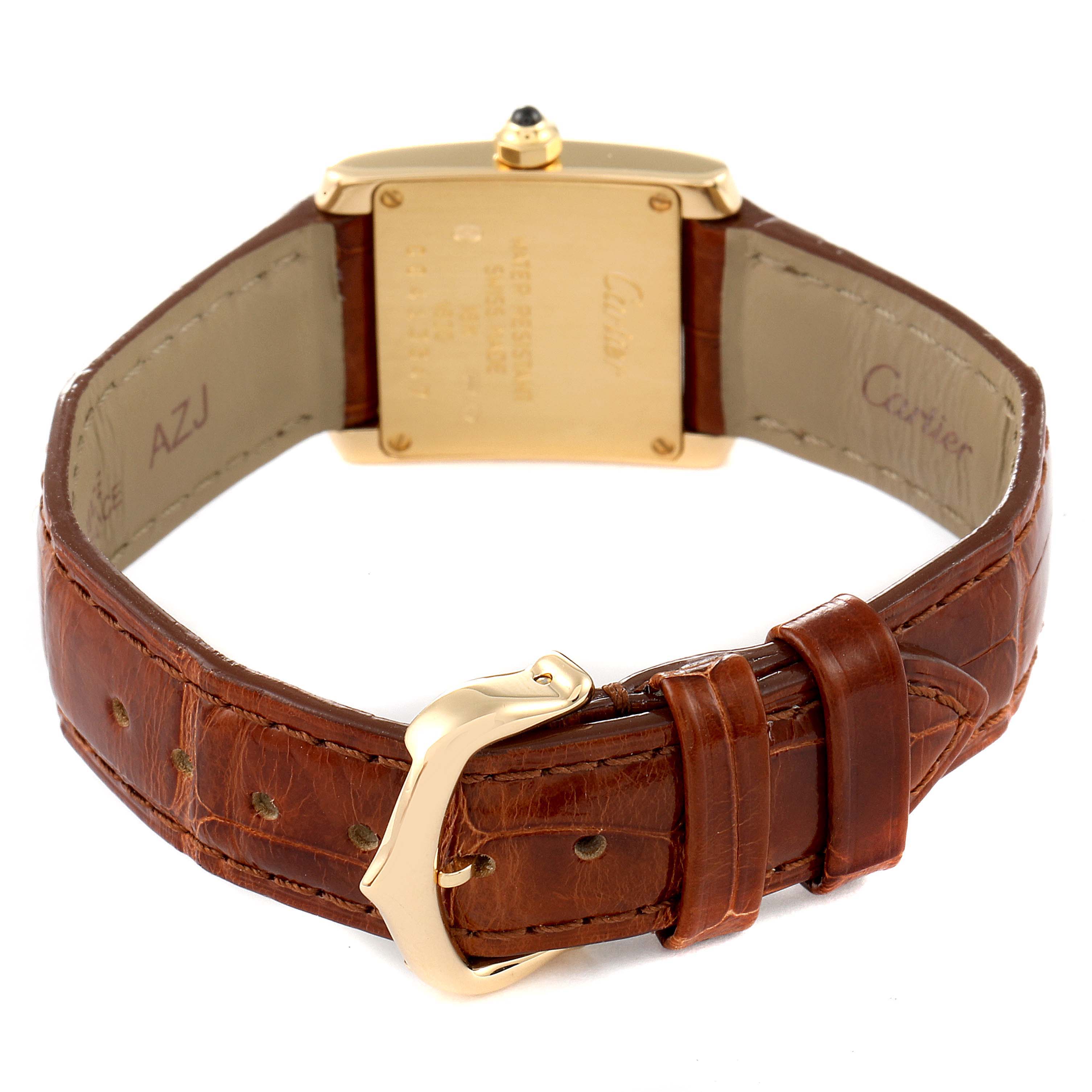 The image shows the back view of a Cartier Tank Francaise W5000256 Women's Yellow Gold Silver Dial W5000256 Women's Yellow Gold Silver Dial watch, highlighting its case back and brown leather strap with buckle.