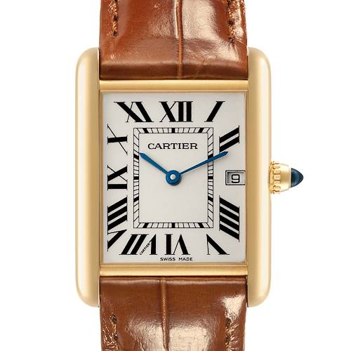 The image shows a frontal view of a Cartier Tank Louis watch, highlighting the face, leather strap, and crown.