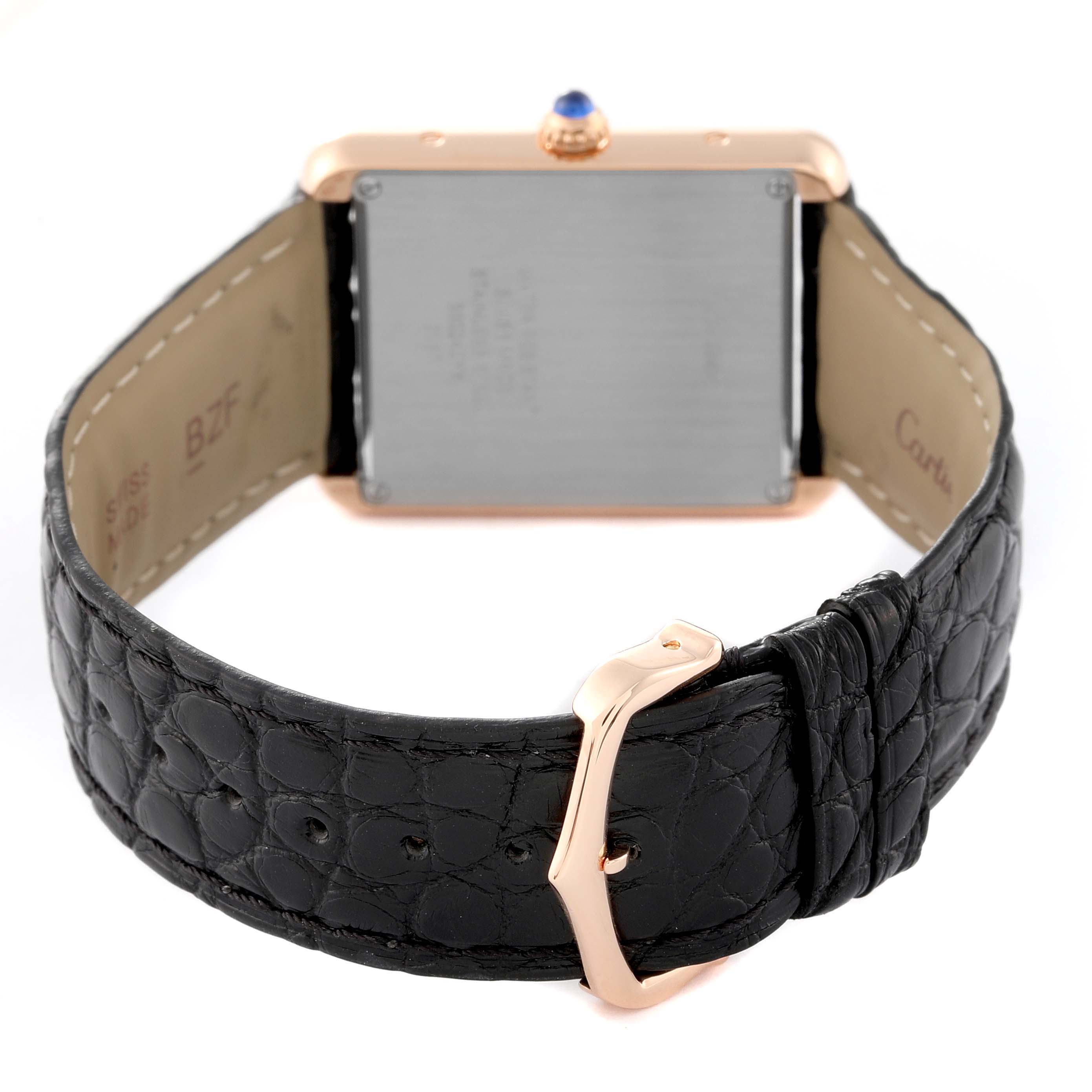 The image shows the back view of the Cartier Tank Solo W5200025 Men's Steel and Gold (two tone) Silver Dial W5200025 Men's Steel and Gold (two tone) Silver Dial watch, focusing on the leather strap and buckle.