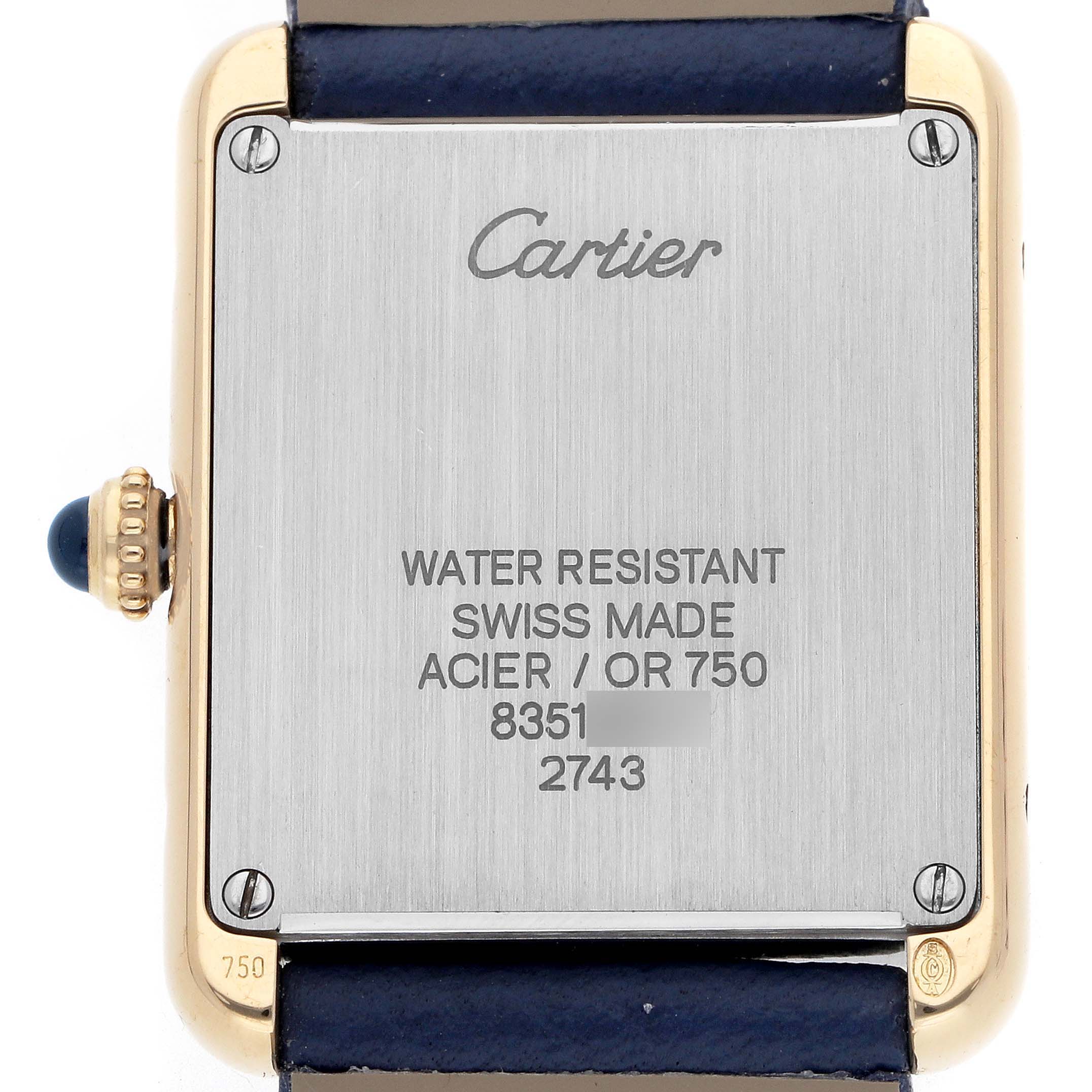 The image shows the back view of a Cartier Tank Solo W1018755 Women
s Steel and Gold (two tone) Silver Dial watch, highlighting the case, screws, and branding details.