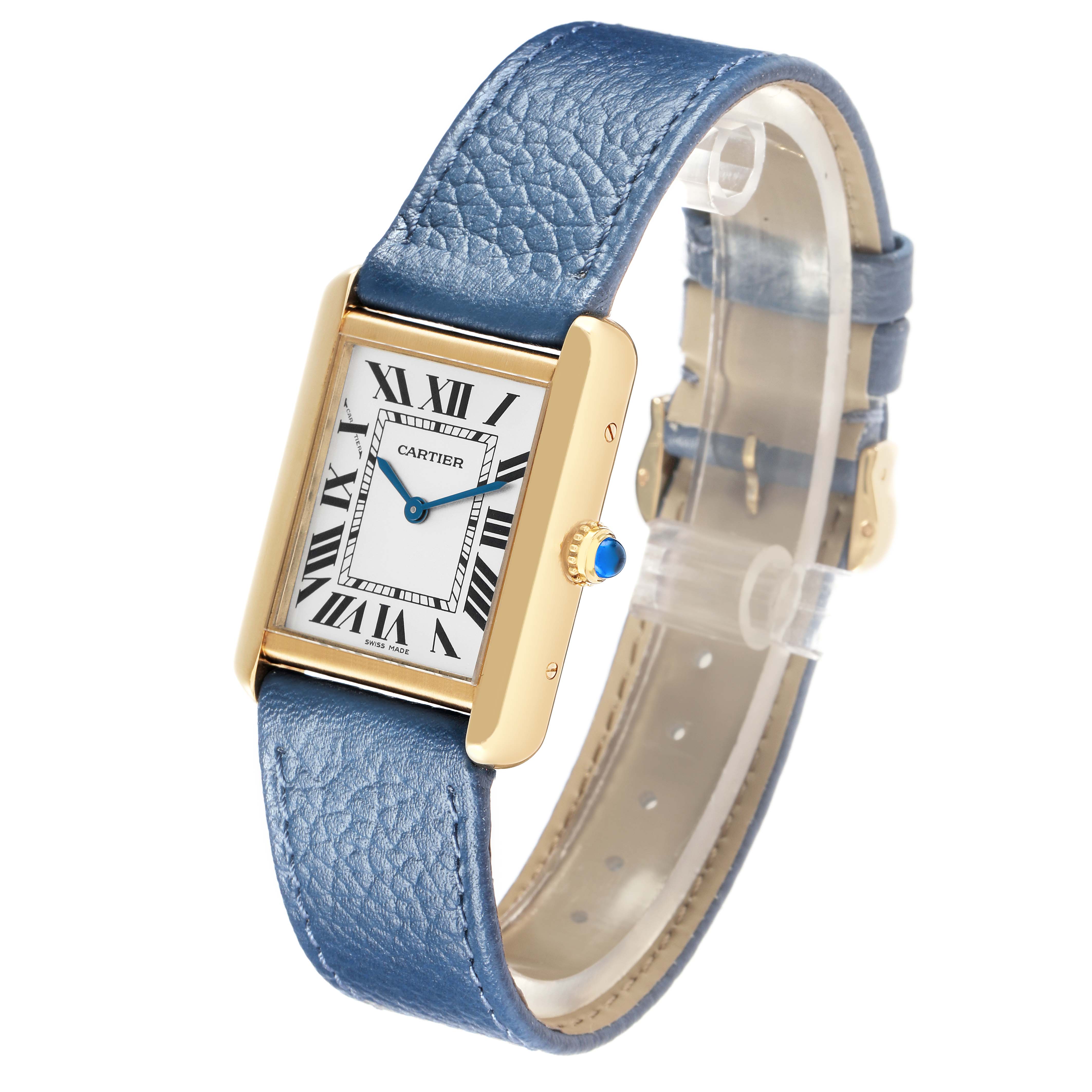The Cartier Tank Solo W1018755 Women
s Steel and Gold (two tone) Silver Dial watch is shown at an angled side view, highlighting its face, crown, and blue leather strap.