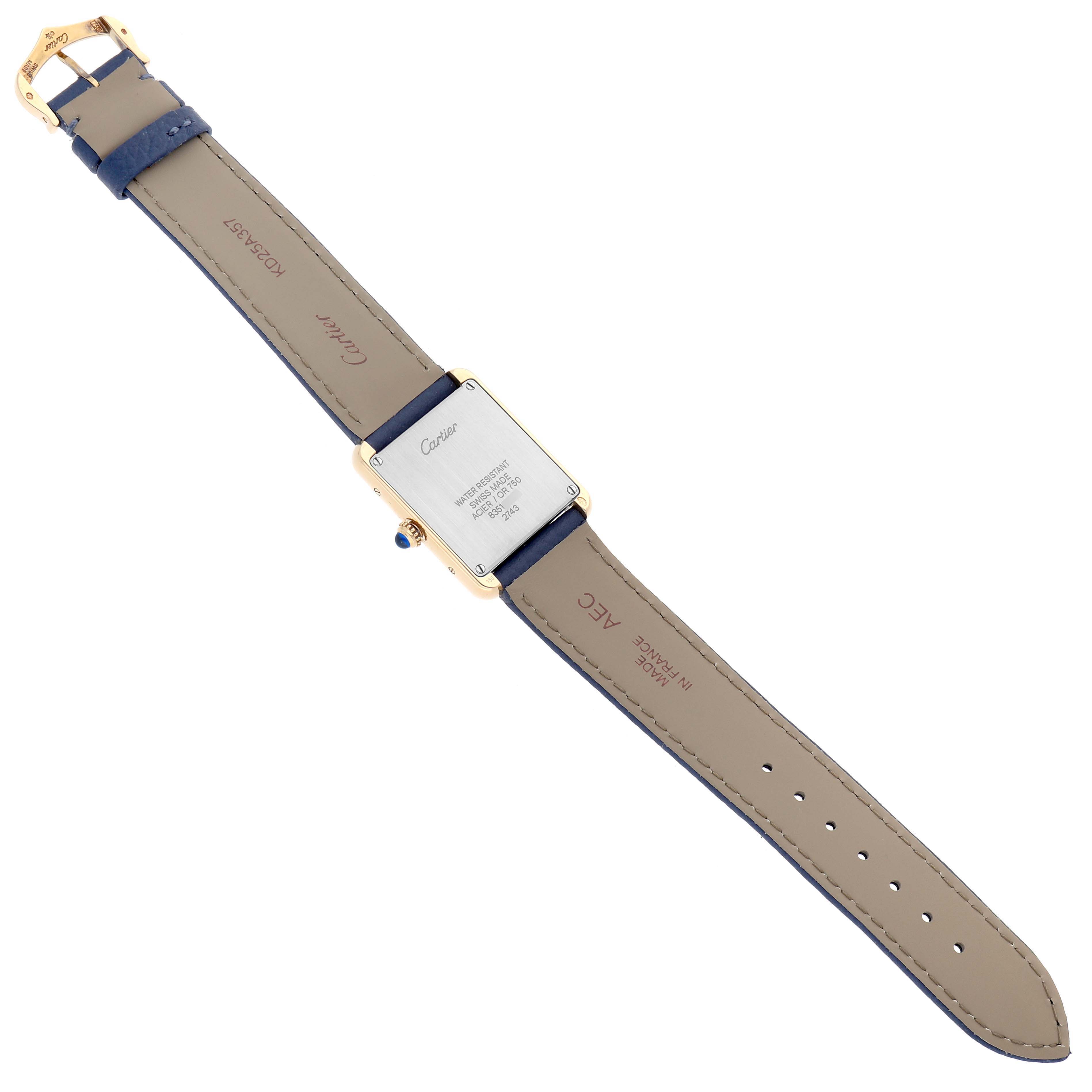 This image shows the back view of the Cartier Tank Solo W1018755 Women
s Steel and Gold (two tone) Silver Dial watch, highlighting the case back, leather strap, and buckle.