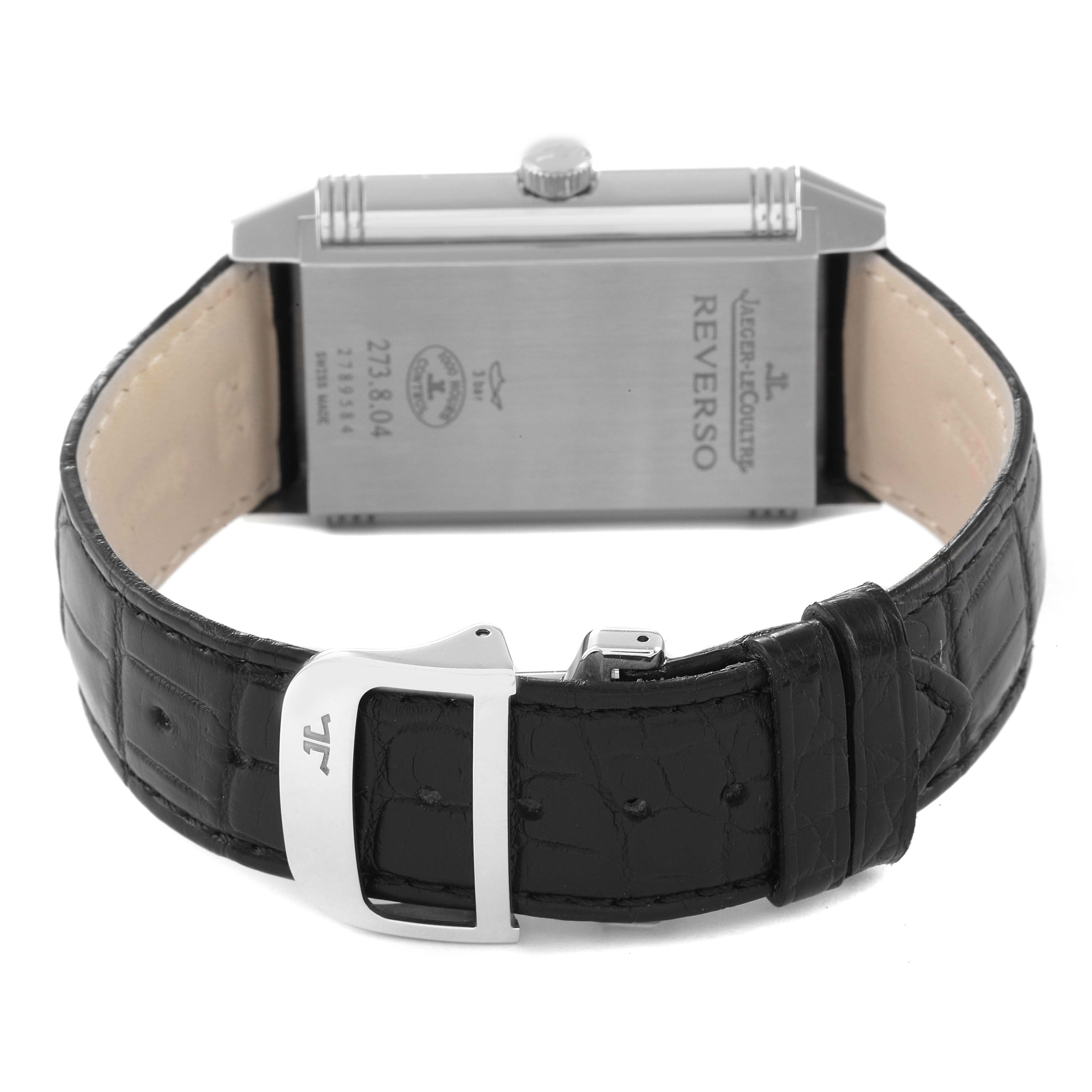 This image shows the back view of a Jaeger LeCoultre Reverso Q3738420 Men's Stainless Steel Silver Dial Q3738420 Men's Stainless Steel Silver Dial watch, highlighting the stainless steel case and black leather strap.
