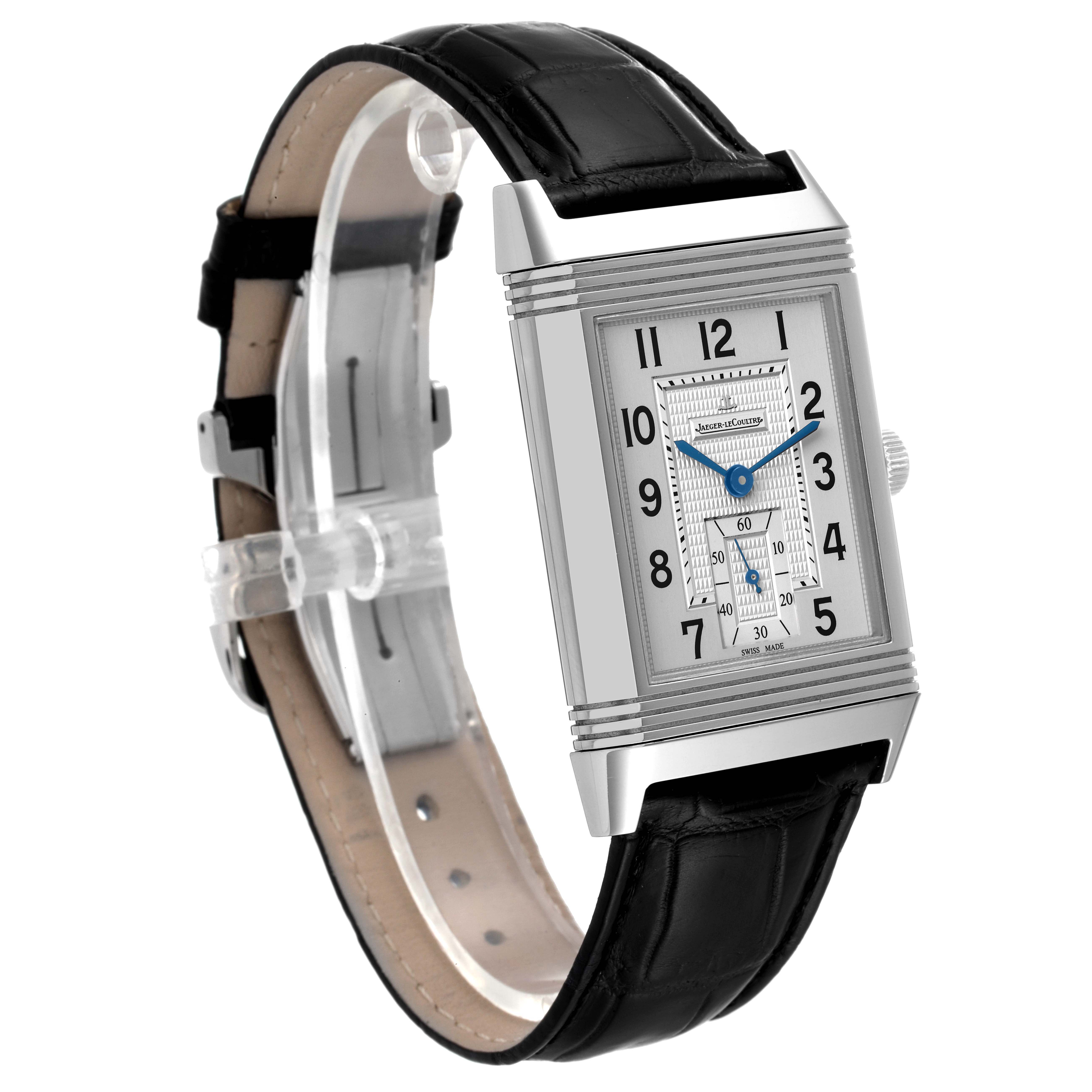 The image shows a Jaeger-LeCoultre Reverso watch at a front-left angle, displaying its face and black leather strap.