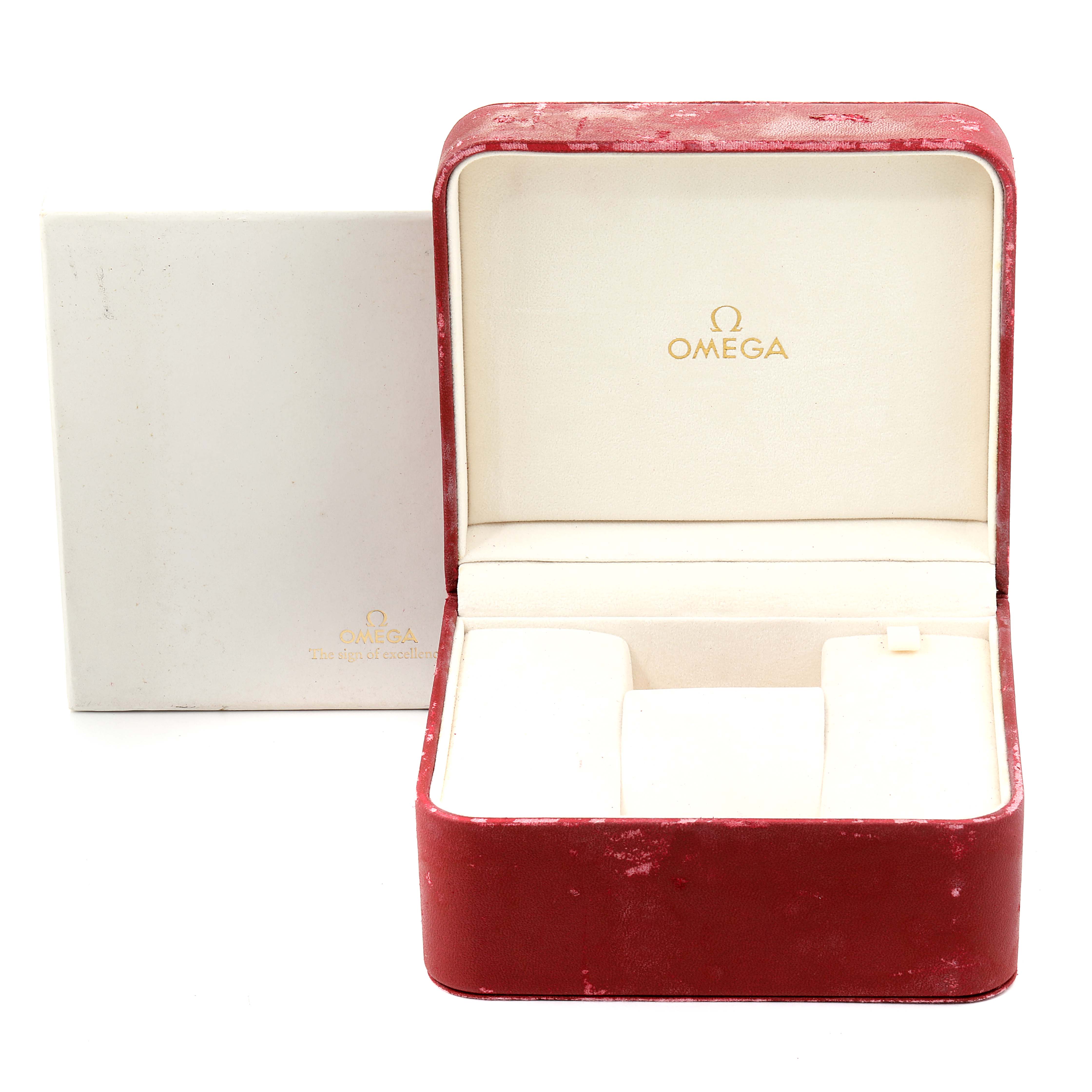 The image shows an open red Omega Constellation 111.20.36.20.52.001 Men
s Steel and Gold (two tone) Silver Dial 111.20.36.20.52.001 Men
s Steel and Gold (two tone) Silver Dial watch box, displaying its interior compartments.