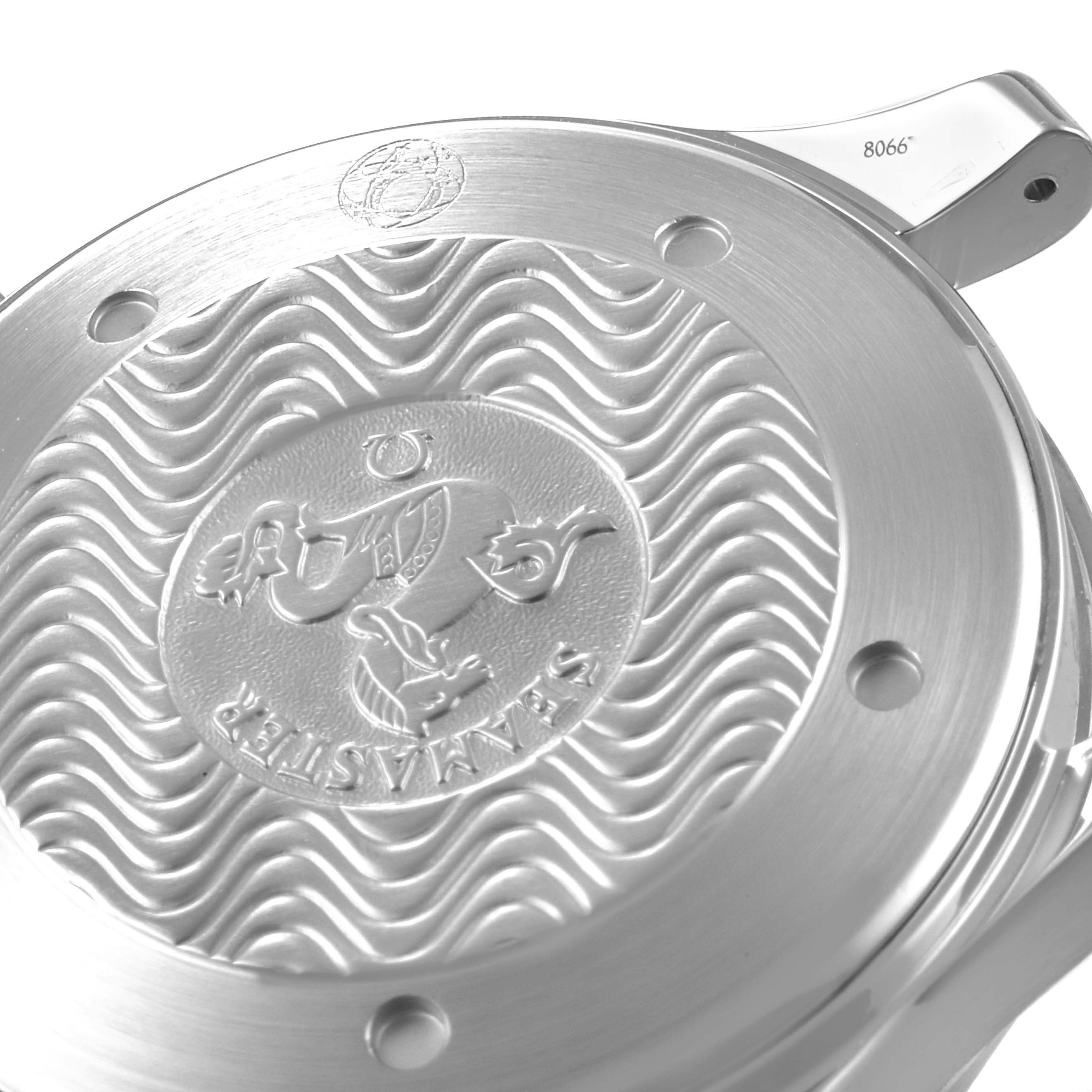 This image shows the case back of an Omega Seamaster 2531.80.00 Men's Stainless Steel Blue Dial 2531.80.00 Men's Stainless Steel Blue Dial watch, highlighting the engraved logo and wave pattern design.