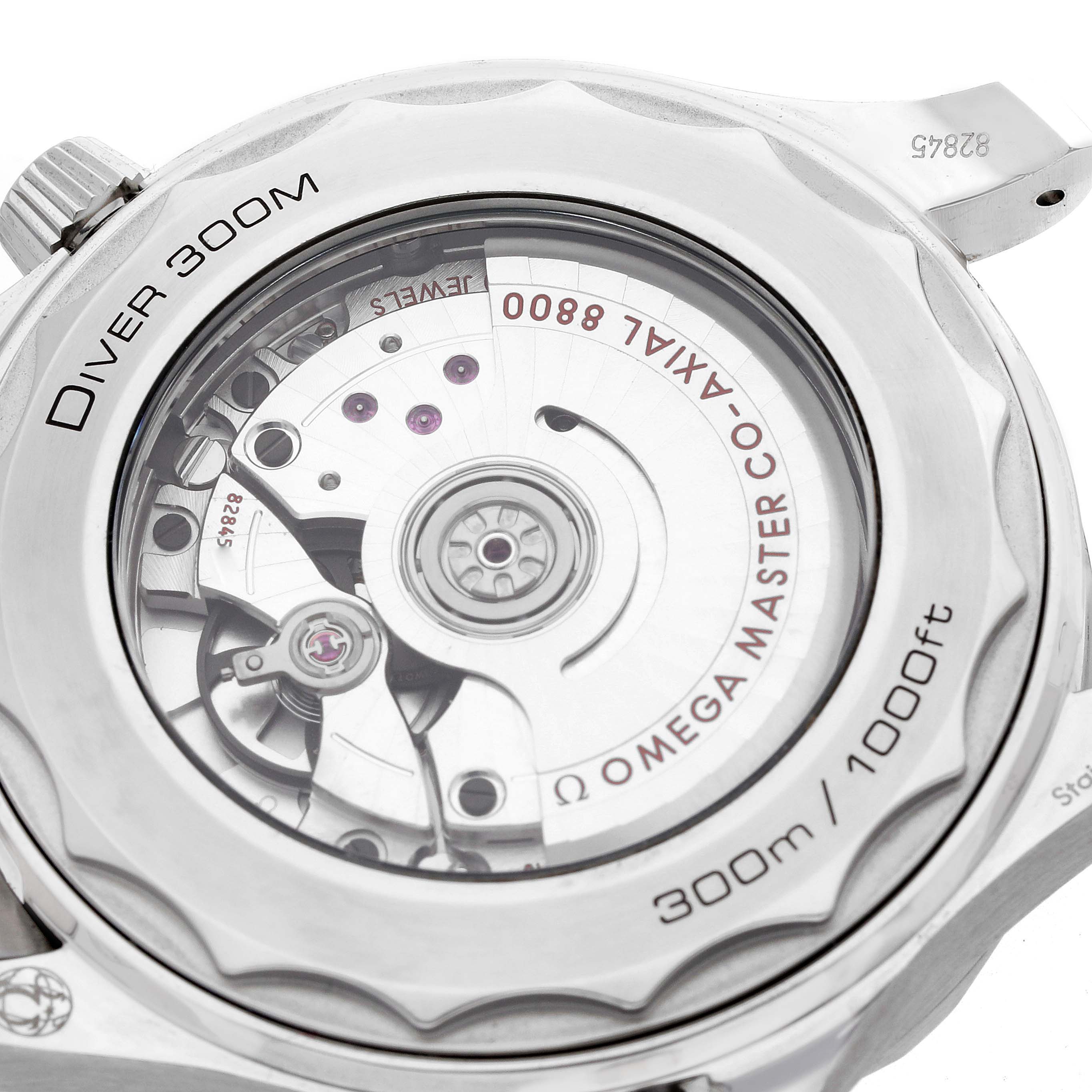 The image shows the back view of an Omega Seamaster 210.30.42.20.01.001 Men
s Stainless Steel Black Dial, highlighting its Co-Axial 8800 movement and Diver 300m marking.