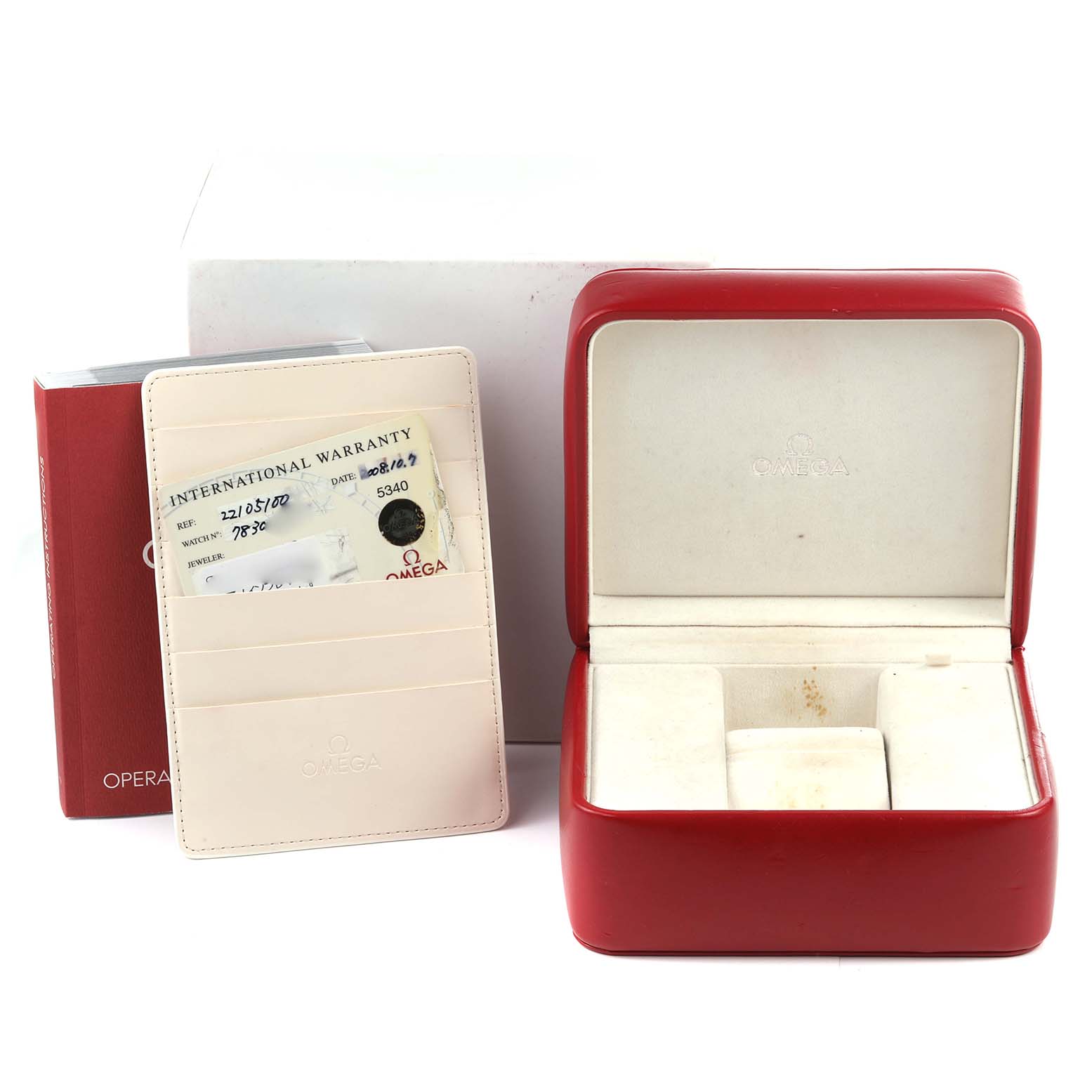 The image shows the Omega Planet Ocean 2210.51.00 Men's Stainless Steel Black Dial 2210.51.00 Men's Stainless Steel Black Dial watch box, warranty card, and booklet from a high angle.