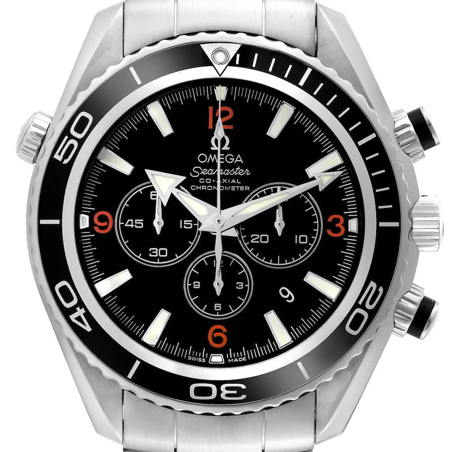 The image shows a front view of the Omega Planet Ocean Seamaster watch, highlighting the black dial, bezel, and chronograph subdials.