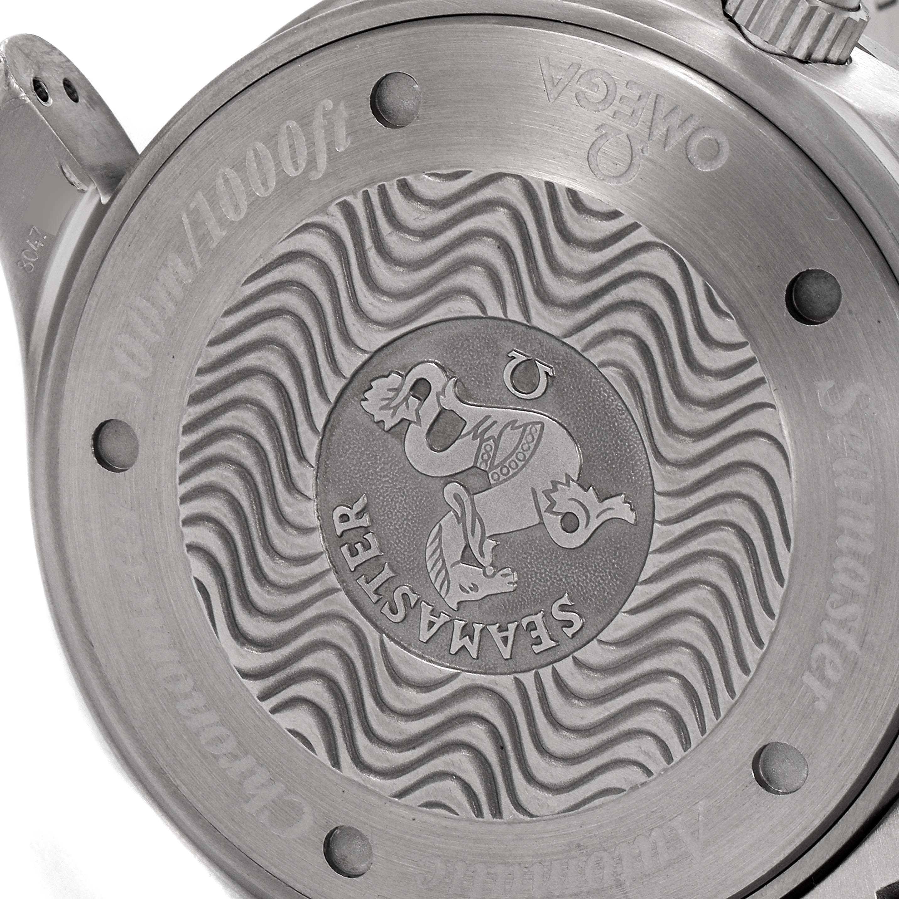 This image shows the case back of an Omega Seamaster 2269.50.00 Men's Titanium Black Dial 2269.50.00 Men's Titanium Black Dial watch, featuring its logo and wave pattern design.