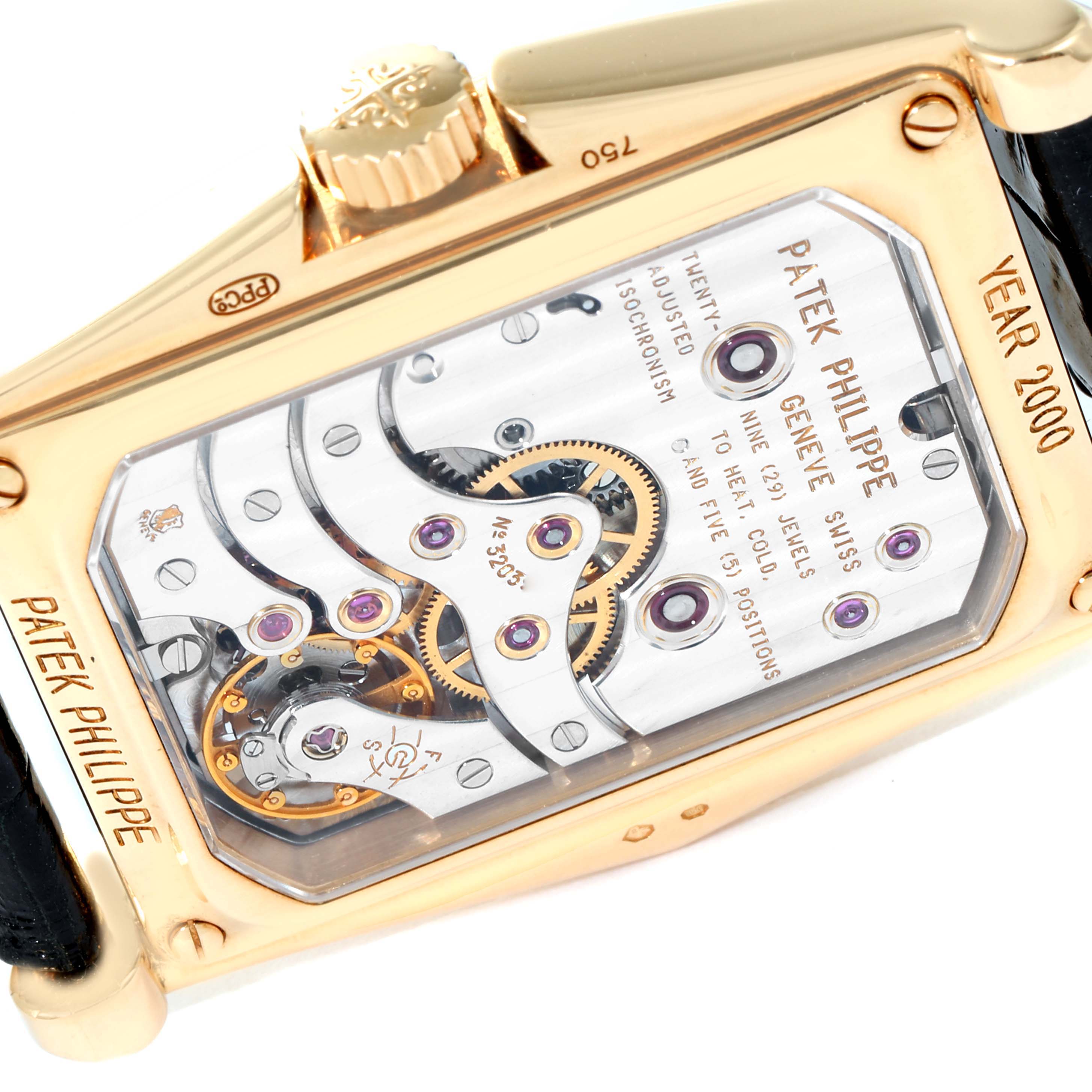 The image shows the back view of a Patek Philippe Gondolo 5100J Men's Yellow Gold Silver Dial 5100J Men's Yellow Gold Silver Dial watch, highlighting its intricate mechanical movement and inner components.