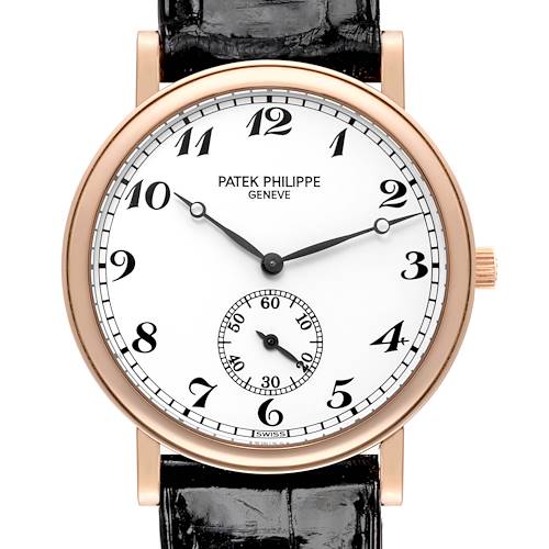 The Patek Philippe Calatrava watch is shown in a close-up, front-facing angle displaying its dial, hands, and crown.