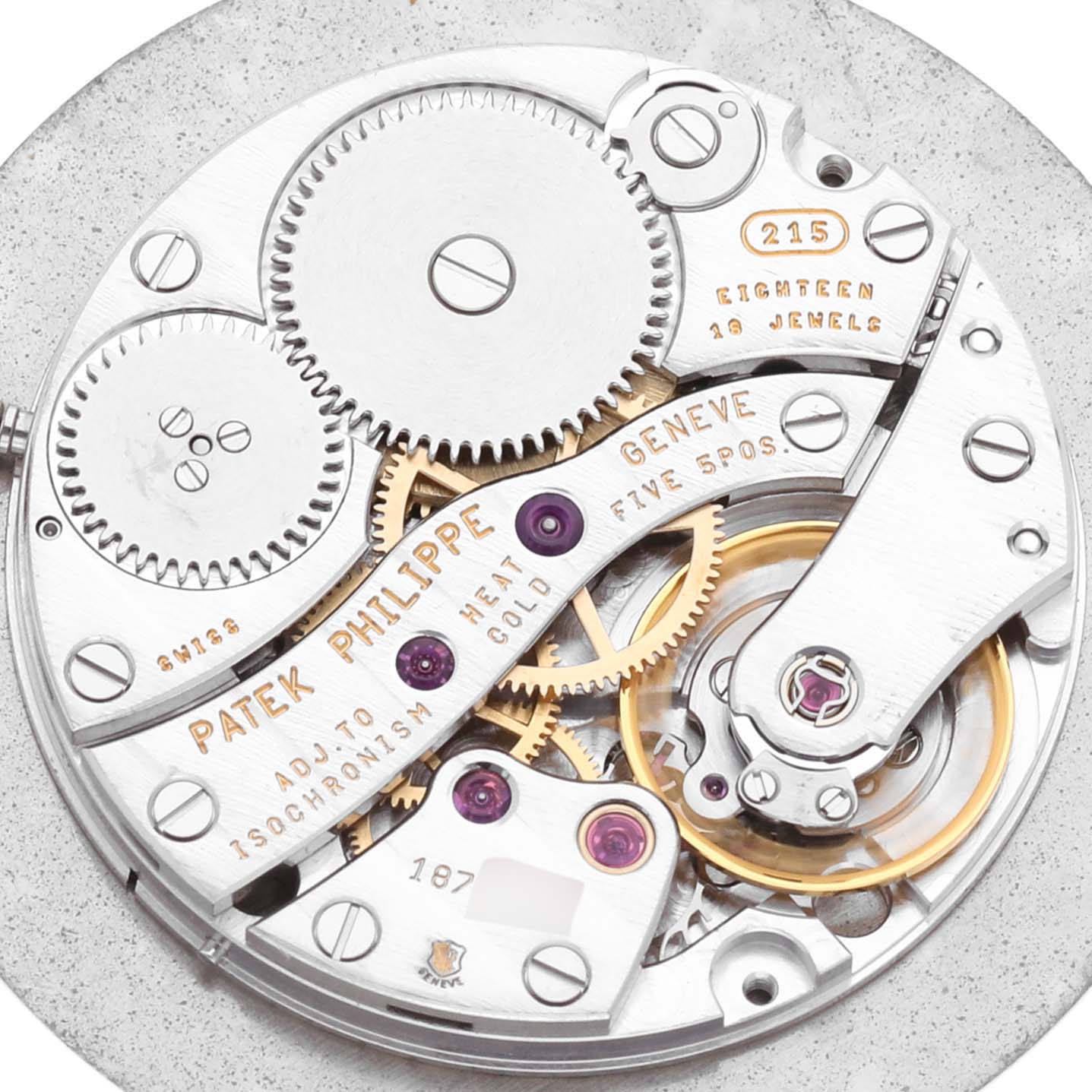 This image shows the intricate movement and gears of a Patek Philippe Calatrava 5022R-010 Men's Rose Gold White Dial 5022R-010 Men's Rose Gold White Dial watch from a top-down angle.