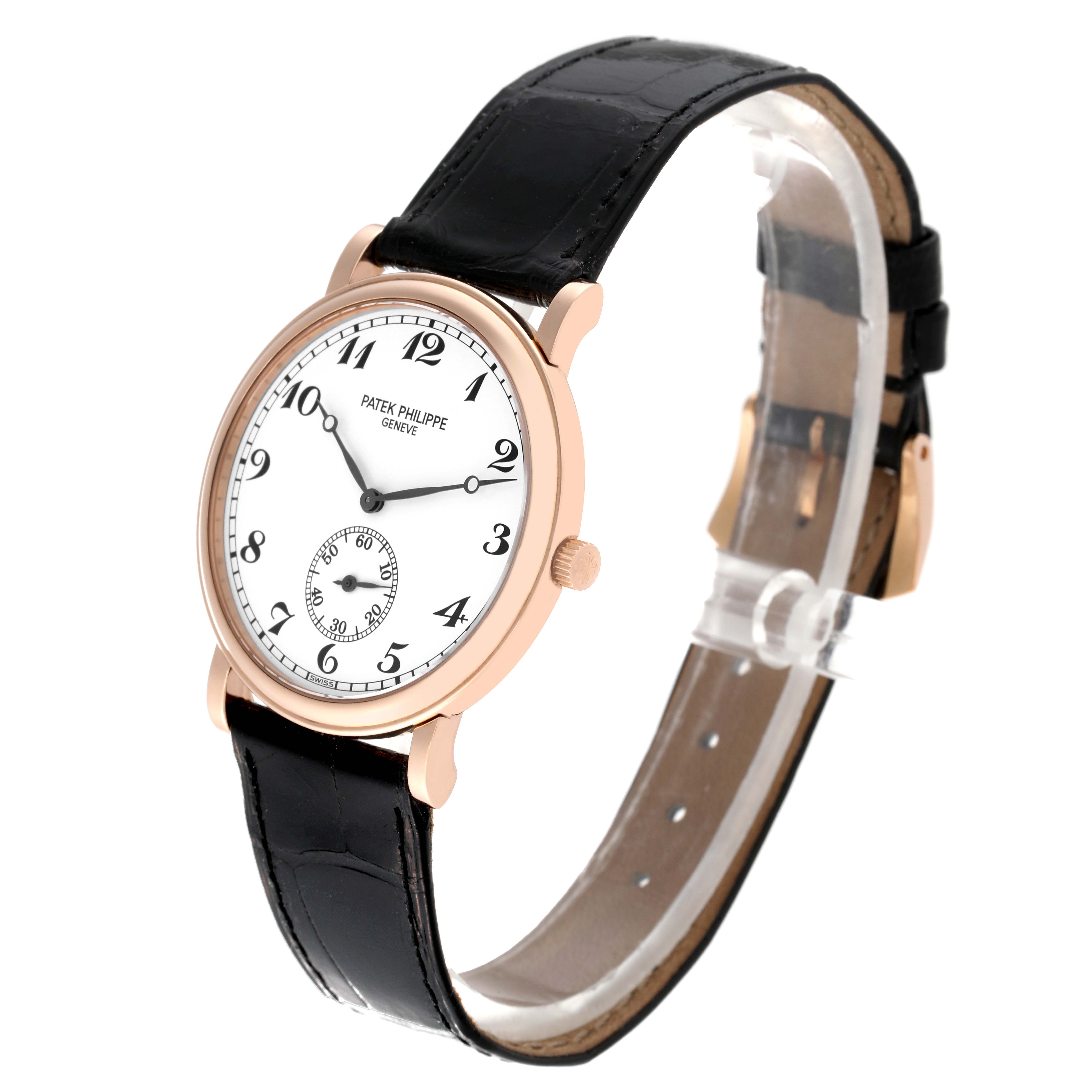 This Patek Philippe Calatrava 5022R-010 Men's Rose Gold White Dial 5022R-010 Men's Rose Gold White Dial watch is shown at a three-quarter angle, highlighting its face, case, crown, and leather strap.