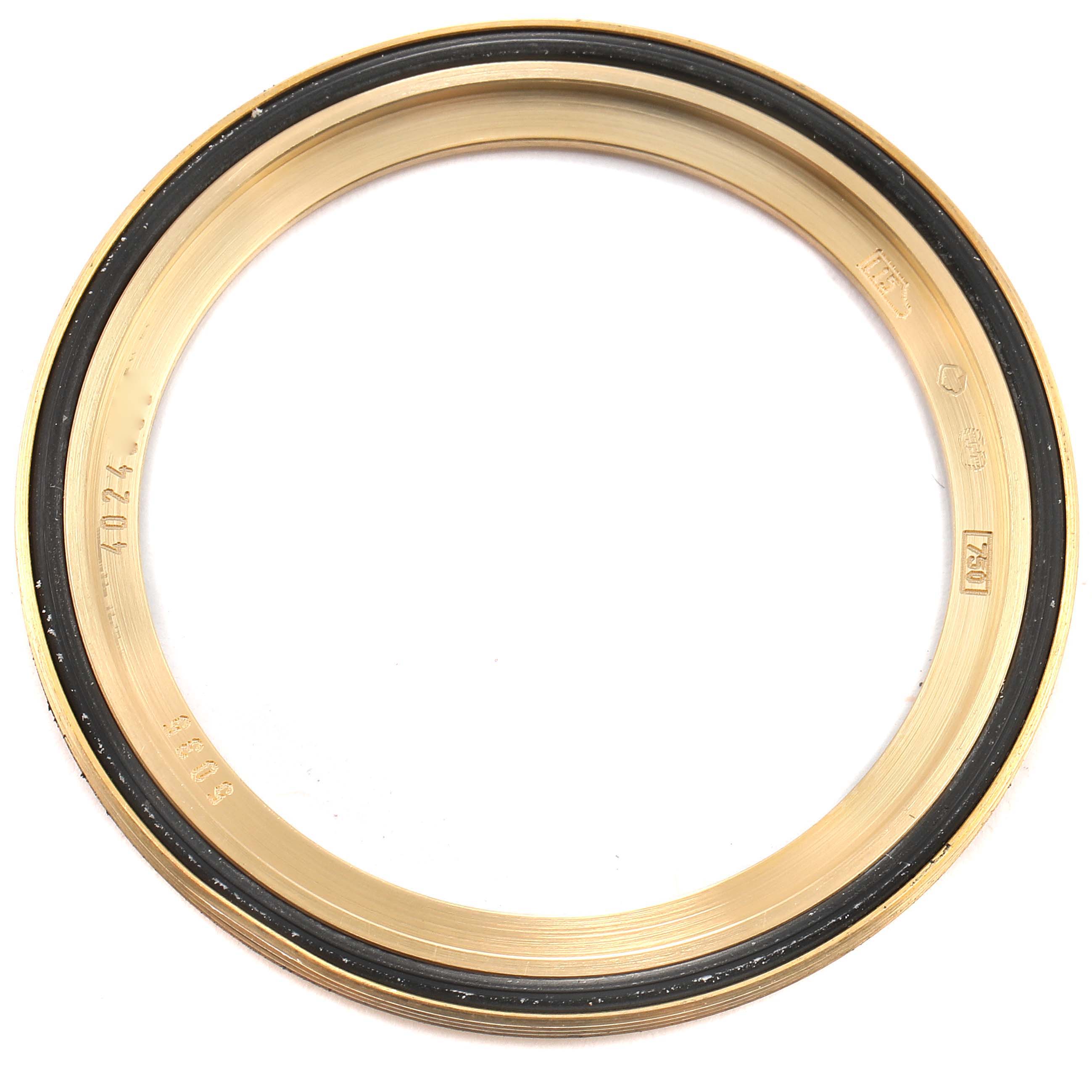 This image shows the bezel of the Patek Philippe 5035 Men's Yellow Gold Silver Dial 5035 Men's Yellow Gold Silver Dial Complicated Annual Calendar Yellow Gold Men's Watch 5035.