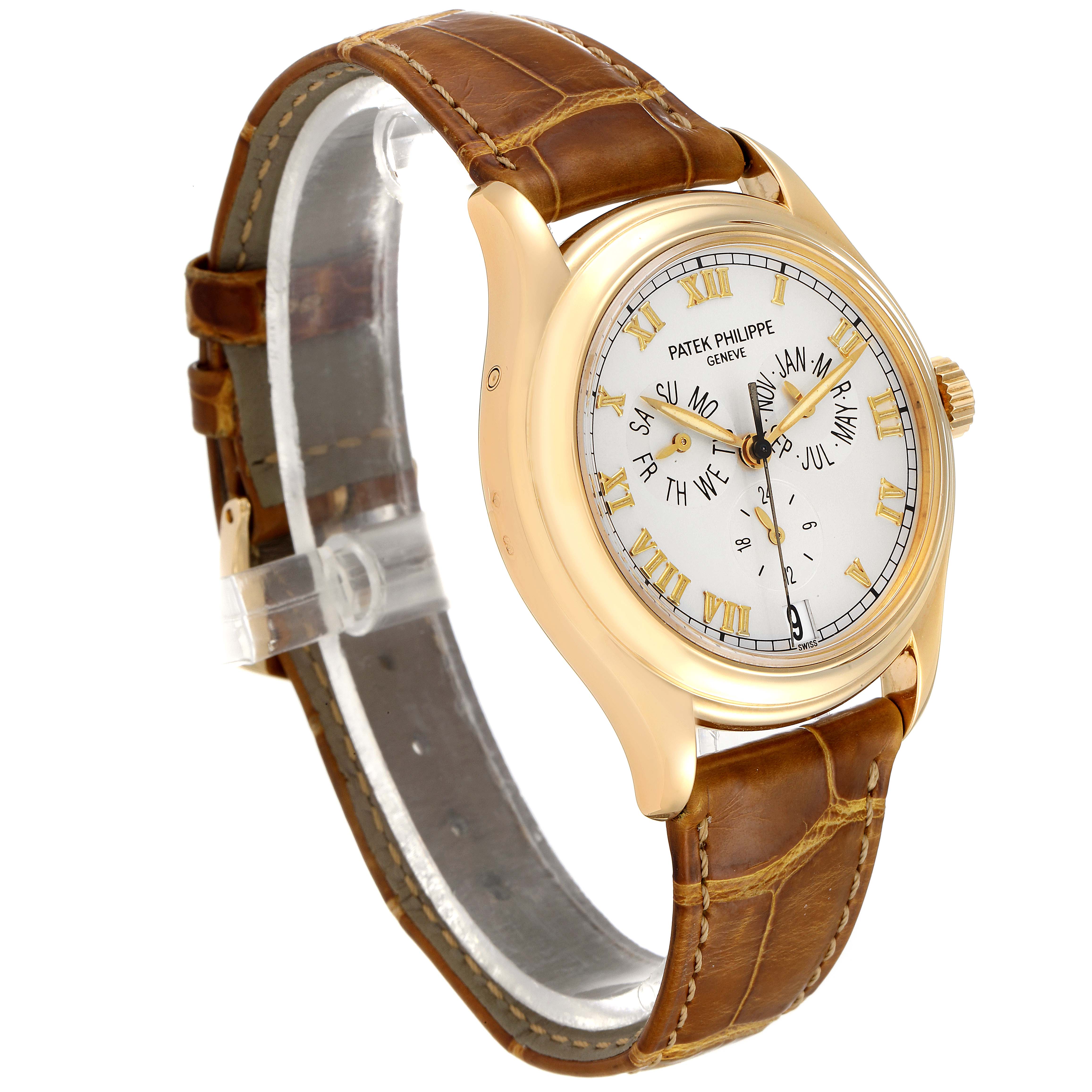 The image shows a side view of the Patek Philippe 5035 Men's Yellow Gold Silver Dial 5035 Men's Yellow Gold Silver Dial Complicated Annual Calendar Yellow Gold Men's Watch 5035 with its brown leather strap.