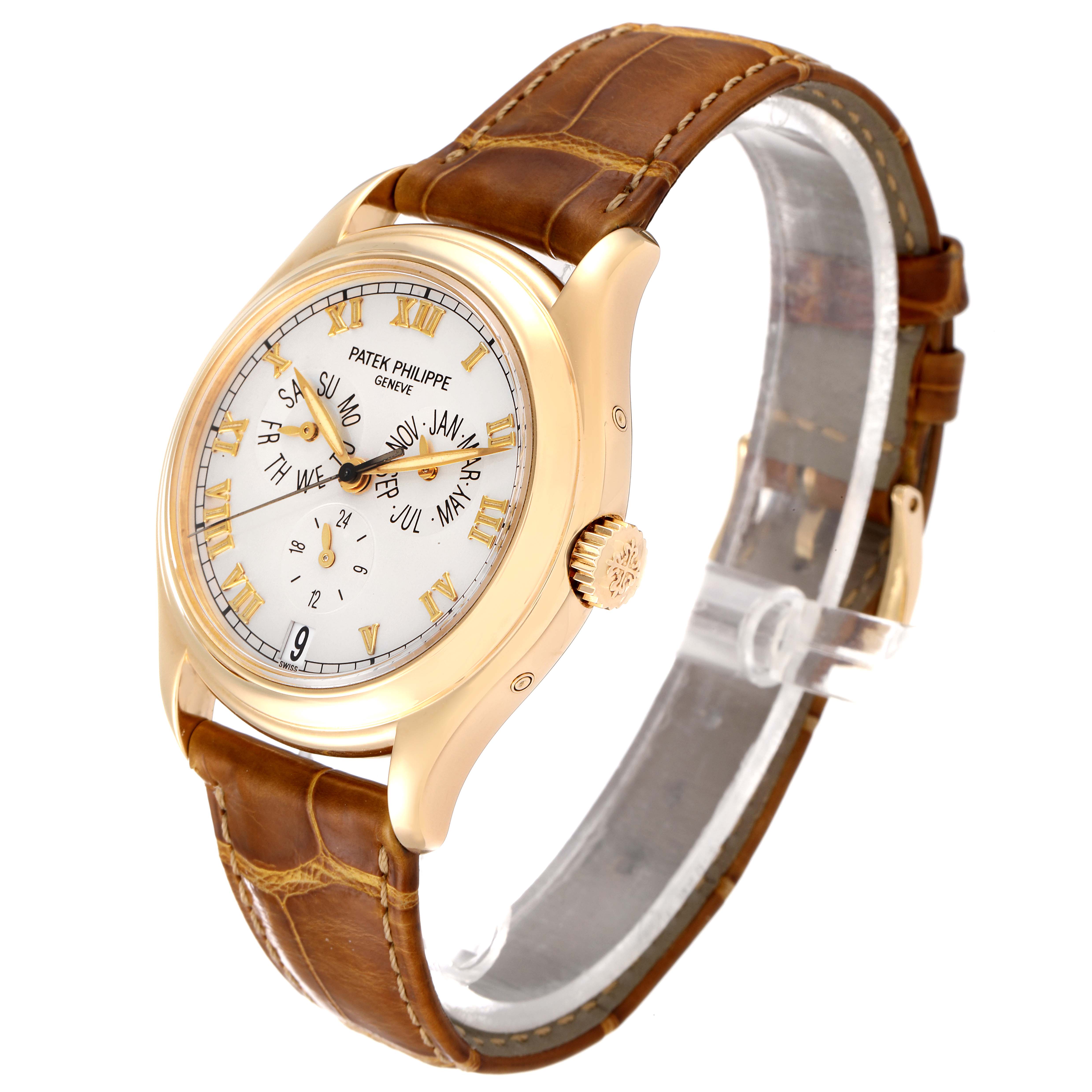The image shows a side-angle view of the Patek Philippe 5035 Men's Yellow Gold Silver Dial 5035 Men's Yellow Gold Silver Dial Complicated Annual Calendar Yellow Gold Men's Watch 5035 model.