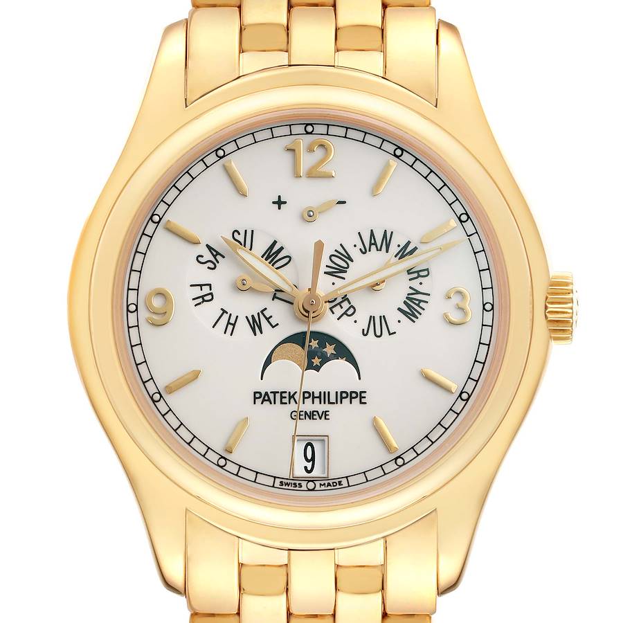 The Patek Philippe Complications 5146J Men's Yellow Gold Beige Dial watch is shown from a top-down angle, highlighting its face, indices, hands, and moon phase.