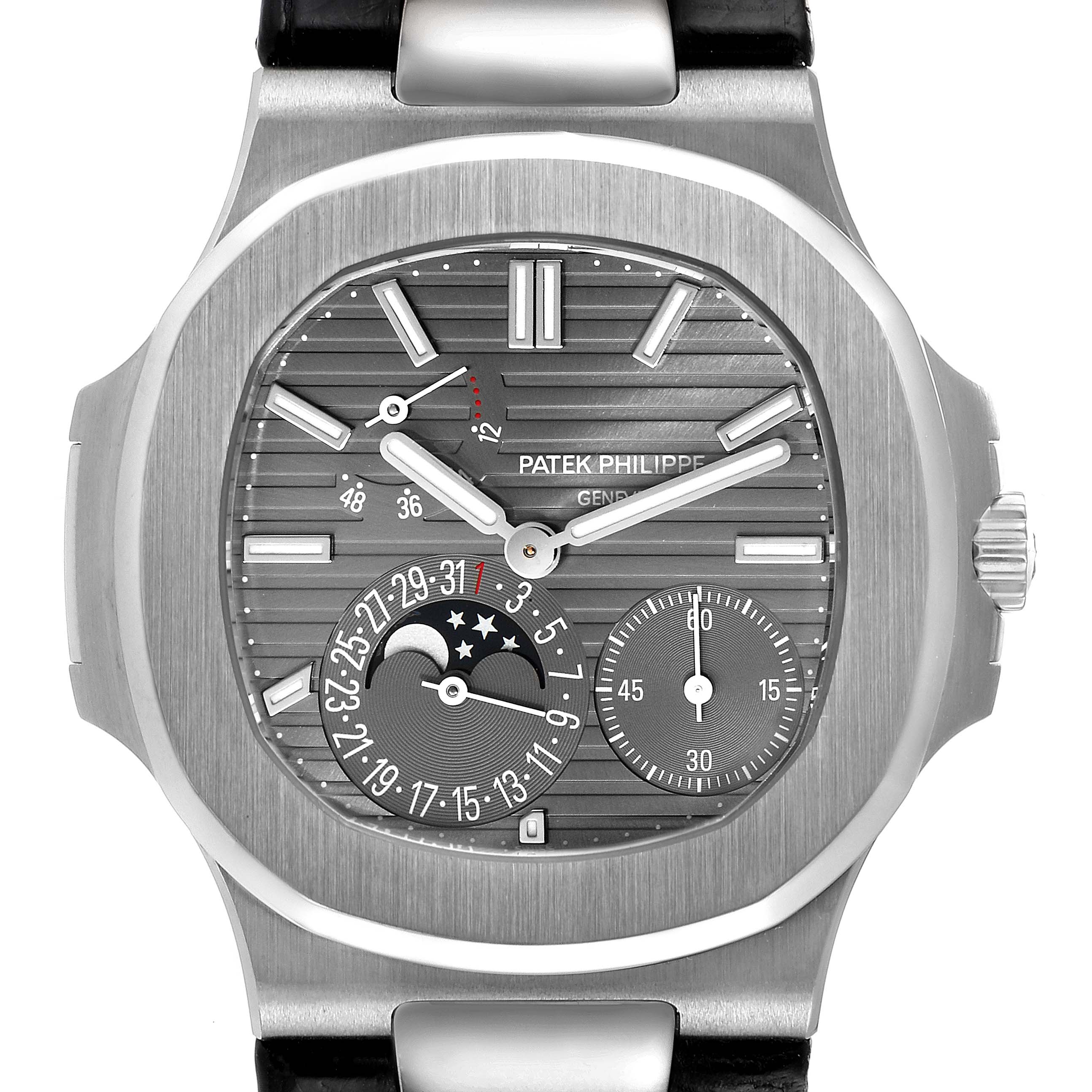Front view of a Patek Philippe Nautilus 5712G/001 Men's White Gold Grey Dial 5712G/001 Men's White Gold Grey Dial watch showing the dial, hands, moon phase, and subdials.