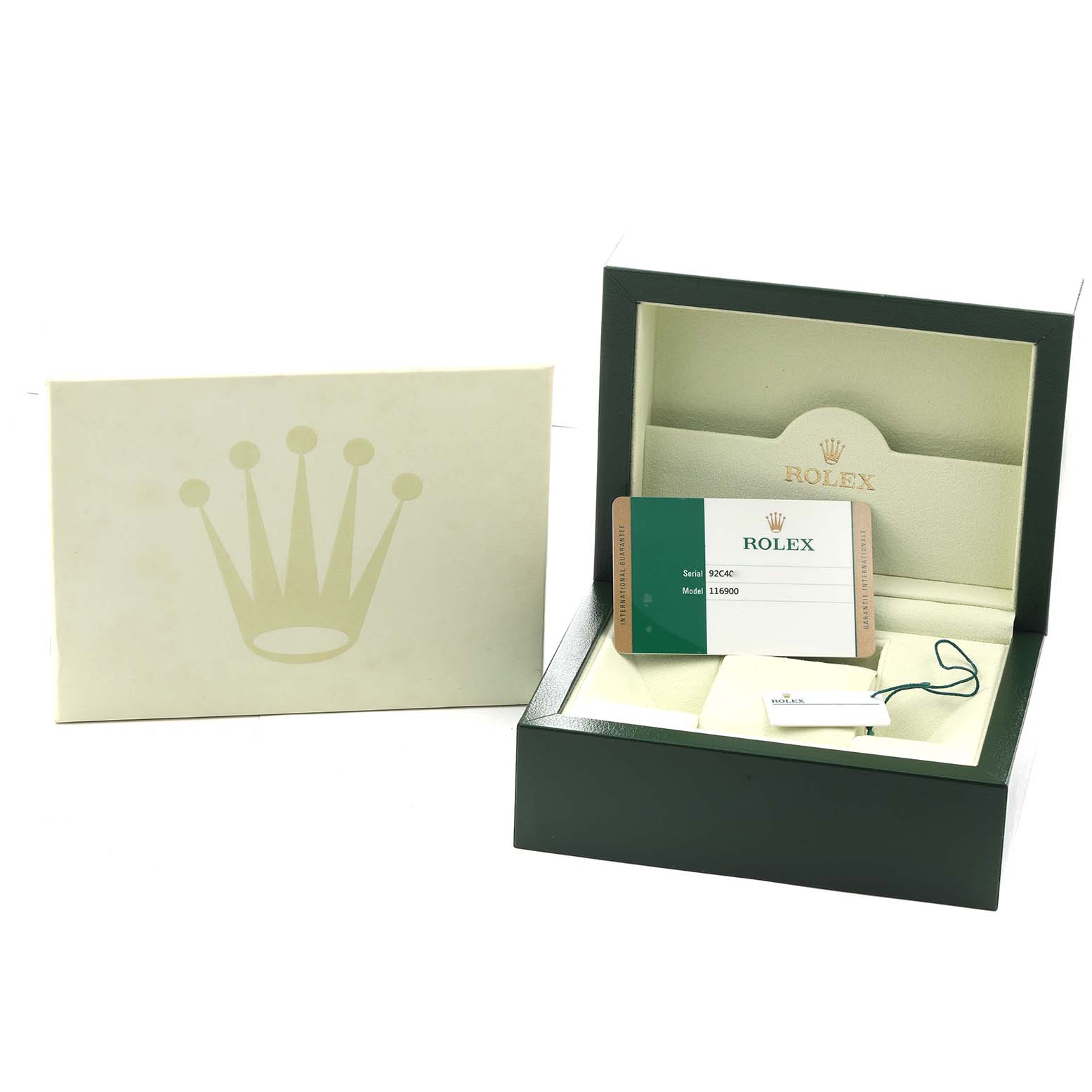 This image shows the packaging and accessories for a Rolex Air-King 116900 Men
s Stainless Steel Black Dial, including a box, warranty card, and booklet.