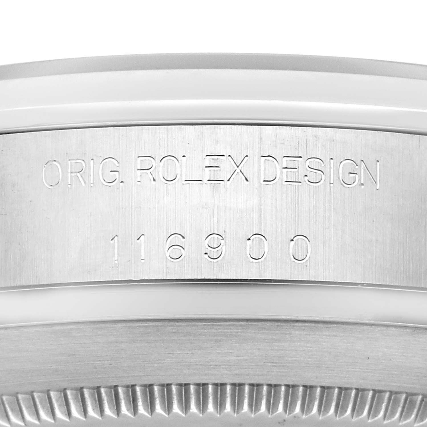 The image shows the side engraving on the case of a Rolex Air-King 116900 Men
s Stainless Steel Black Dial, featuring the model number and "Orig. Rolex Design."