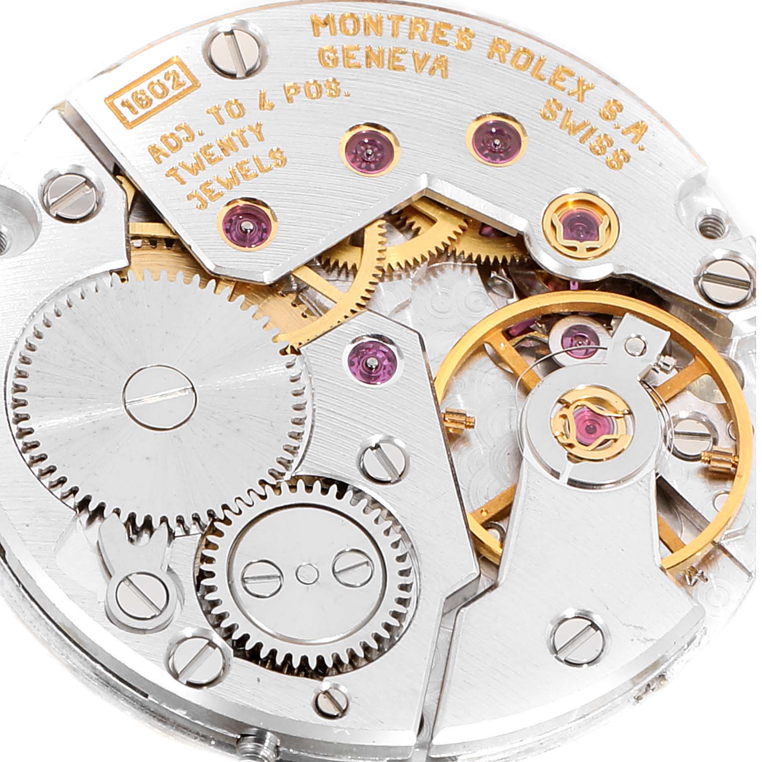 This is a close-up view of the movement and inner components of the Rolex Cellini 4114 Men's Yellow Gold Silver Dial 4114 Men's Yellow Gold Silver Dial watch, showcasing gears and jewels.