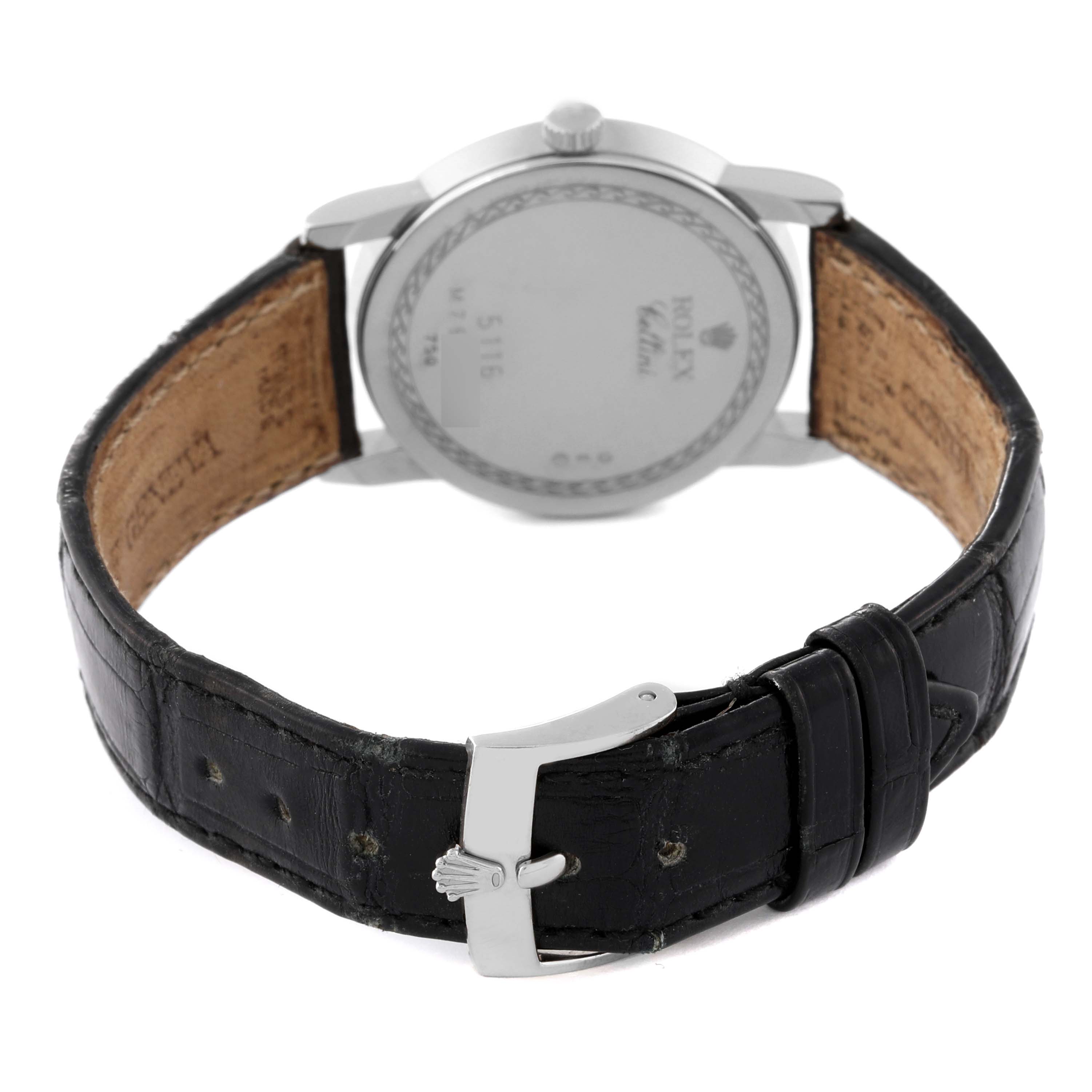 This image shows the back view of a Rolex Cellini 5116/9 Men's White Gold Mother of Pearl Dial 5116/9 Men's White Gold Mother of Pearl Dial model watch, highlighting the caseback and leather strap with its clasp.