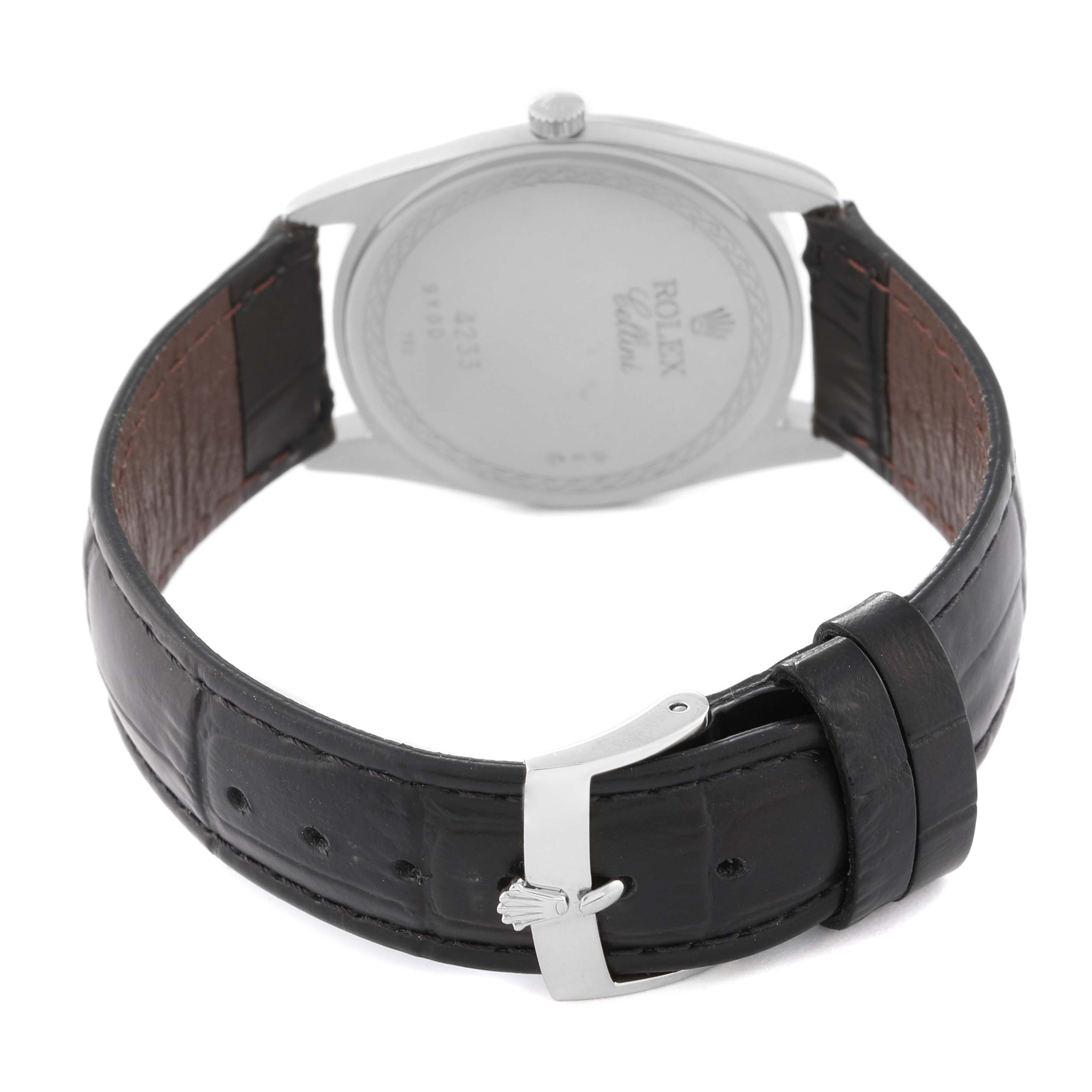 The image shows the back view of a Rolex Cellini 4233 Men's White Gold Black Dial 4233 Men's White Gold Black Dial watch, highlighting the case back and leather strap with a metal buckle.
