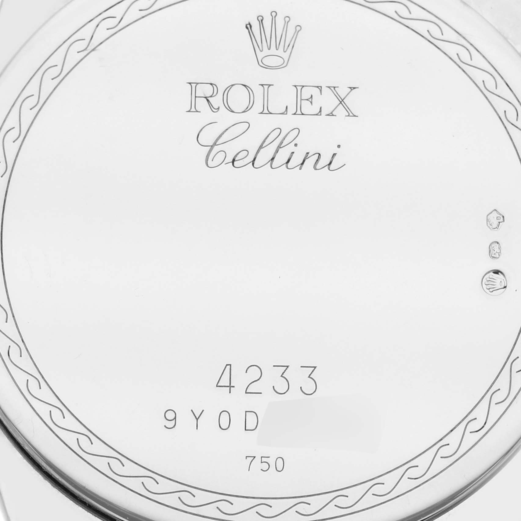 This is a close-up image showing the back case of a Rolex Cellini 4233 Men's White Gold Black Dial 4233 Men's White Gold Black Dial watch, including its engravings and hallmarks.