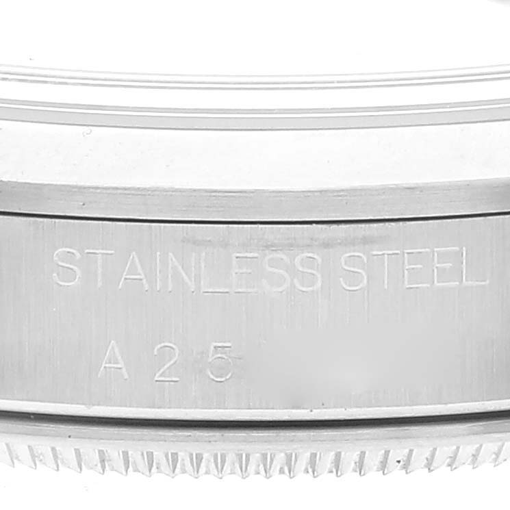 This image shows a close-up of the case side of a Rolex Date 15200 Men's Stainless Steel Black Dial 15200 Men's Stainless Steel Black Dial model watch, highlighting the "Stainless Steel" engraving.