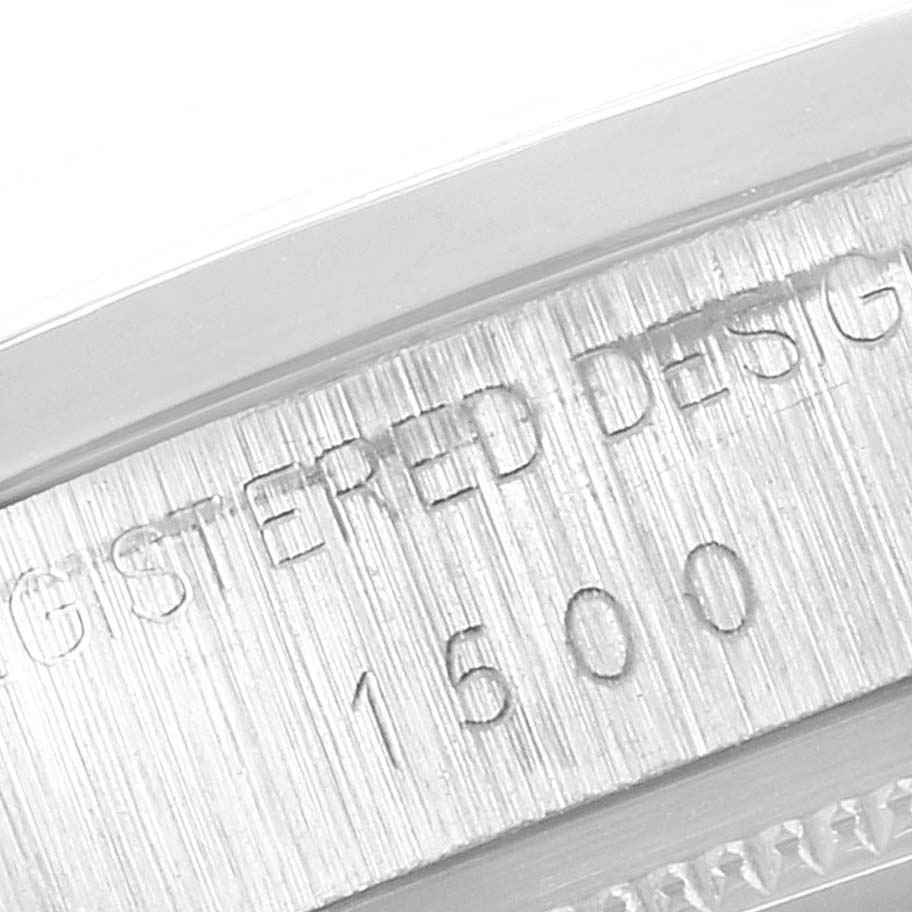 This close-up image shows the engraved model number of a Vintage Collection watch by Rolex.