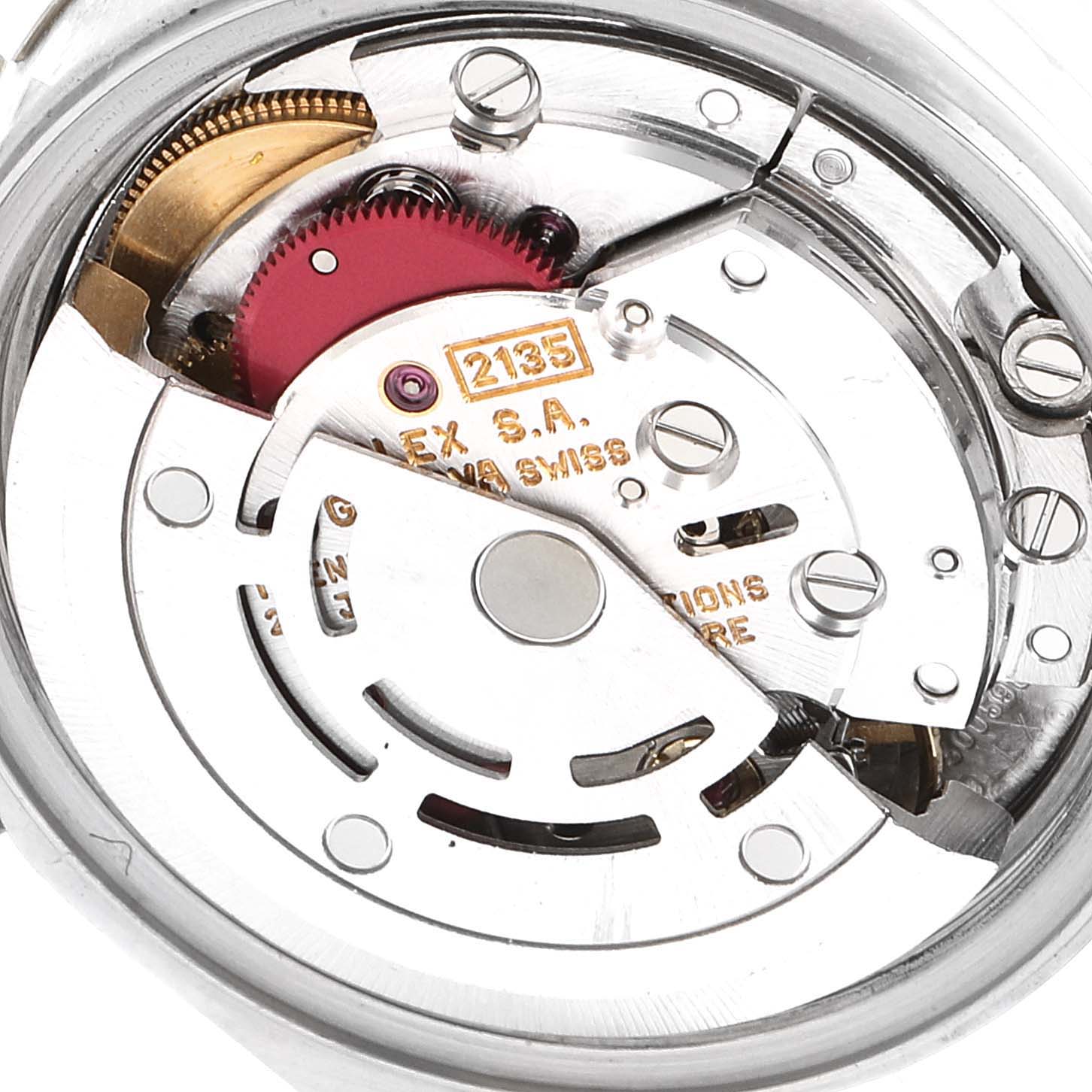 This image shows a close-up of the movement mechanism of a Rolex Datejust 69173 Women's Steel and Gold (two tone) Champagne Dial 69173 Women's Steel and Gold (two tone) Champagne Dial watch, highlighting gears and intricate components.