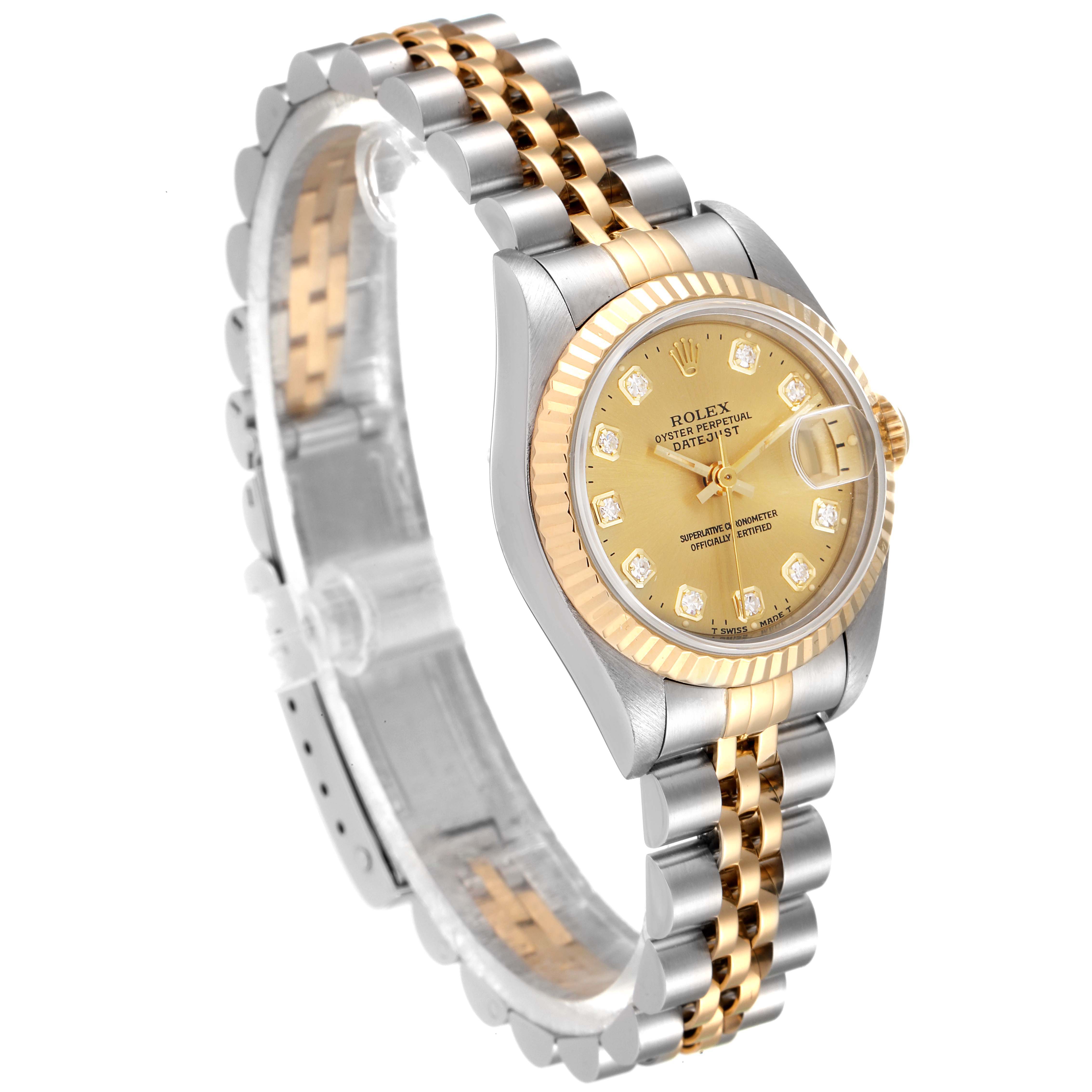 The Rolex Datejust 69173 Women's Steel and Gold (two tone) Champagne Dial 69173 Women's Steel and Gold (two tone) Champagne Dial watch is shown at a three-quarter angle, displaying the gold dial, fluted bezel, and two-tone metal bracelet.