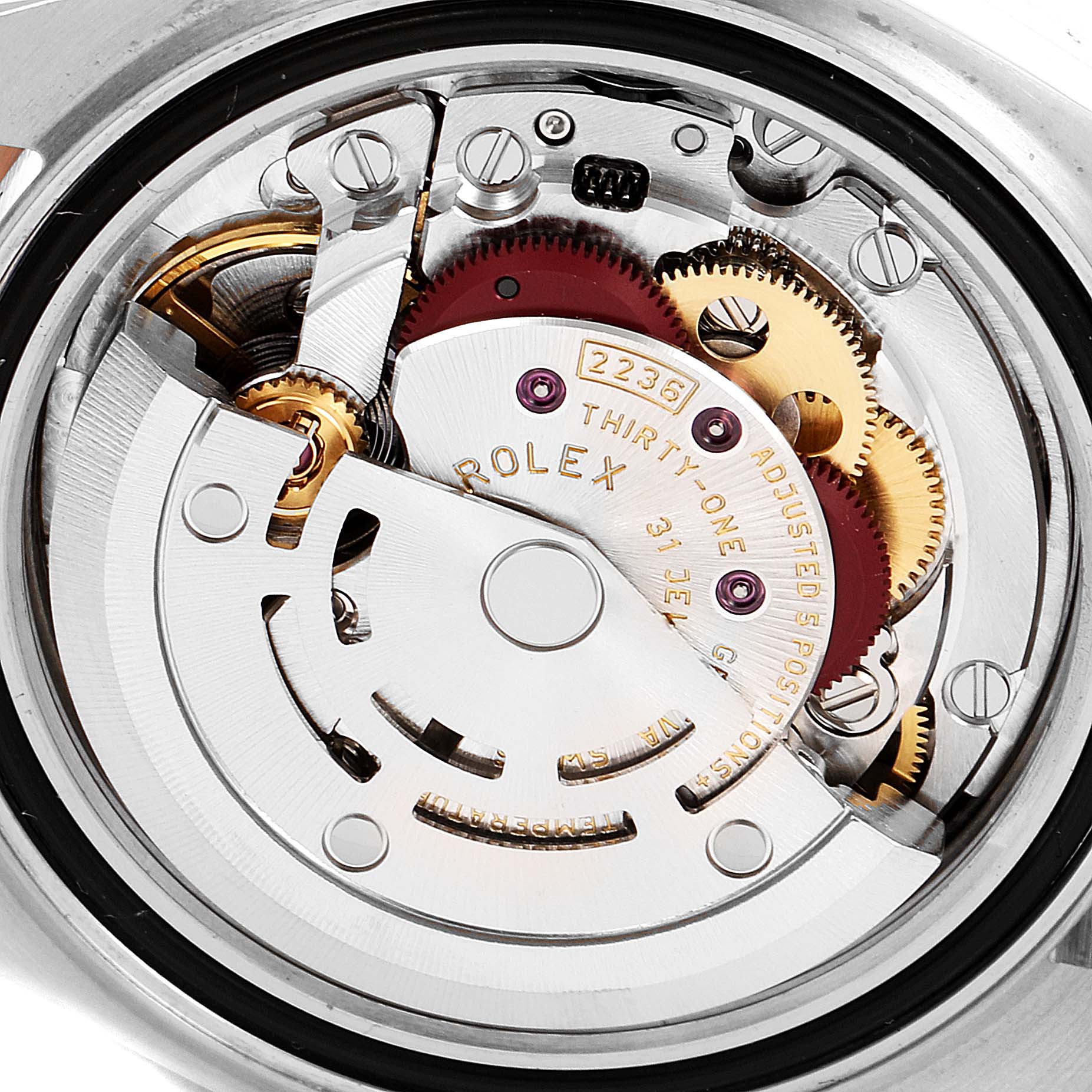 The image shows the Rolex Datejust 279381 Women's Steel and Gold (two tone) Pink Dial 279381 Women's Steel and Gold (two tone) Pink Dial model's movement and interior mechanisms from the case back angle.